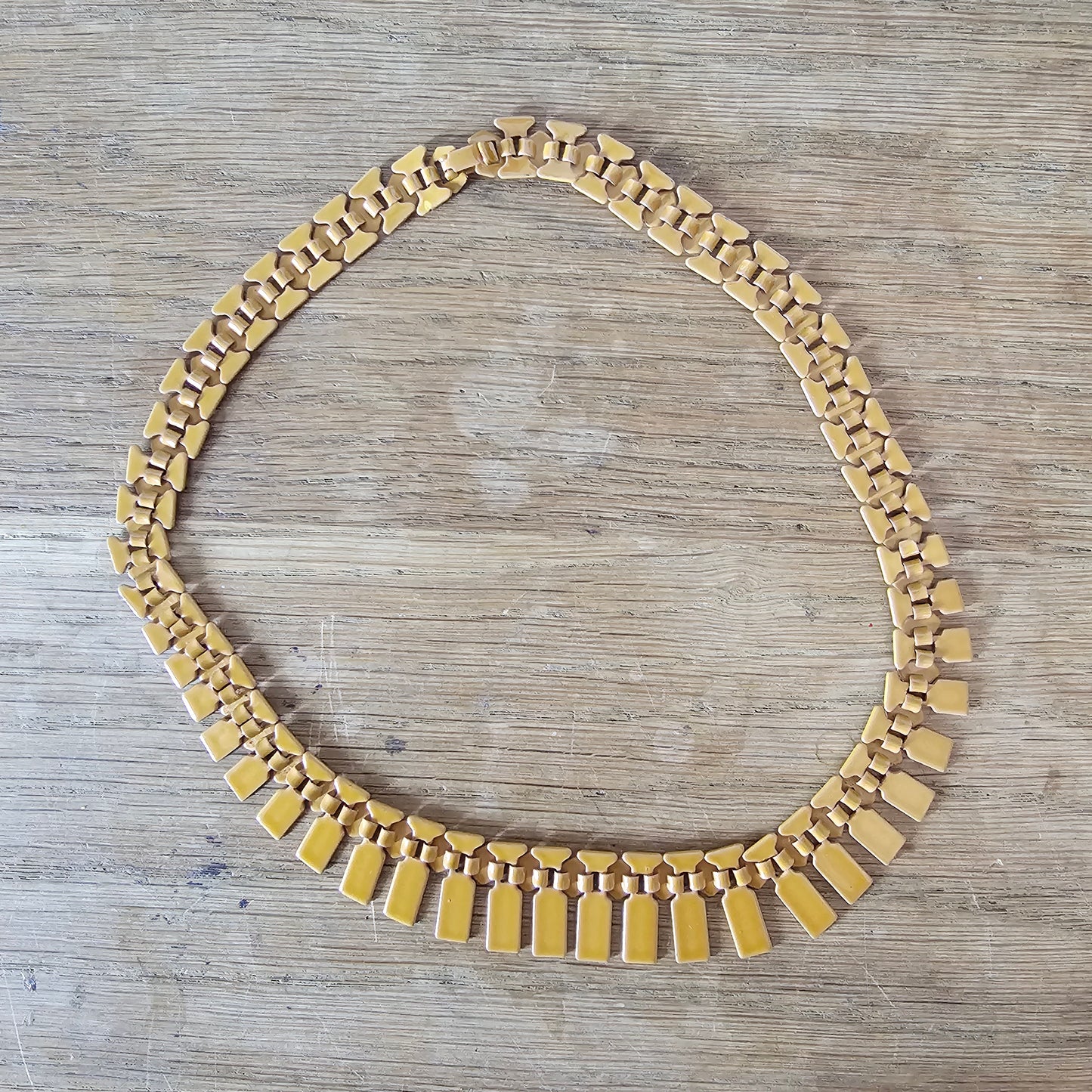 Vintage 1980s-style mustard enamel metal geometric fringe bib necklace