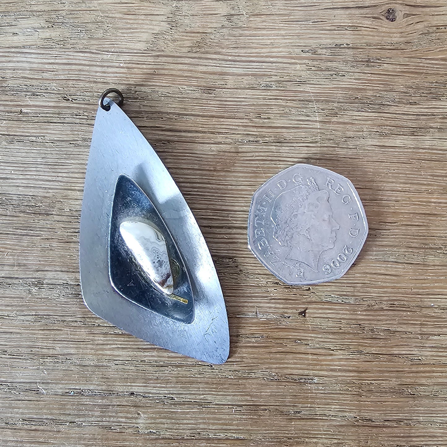 1970s modernist stainless steel pendant with small agate stone inlay