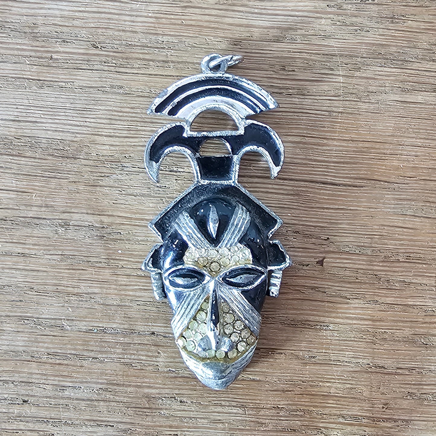 Vintage Coro Art Deco-style silver-tone & black enamel tribal mask pendant