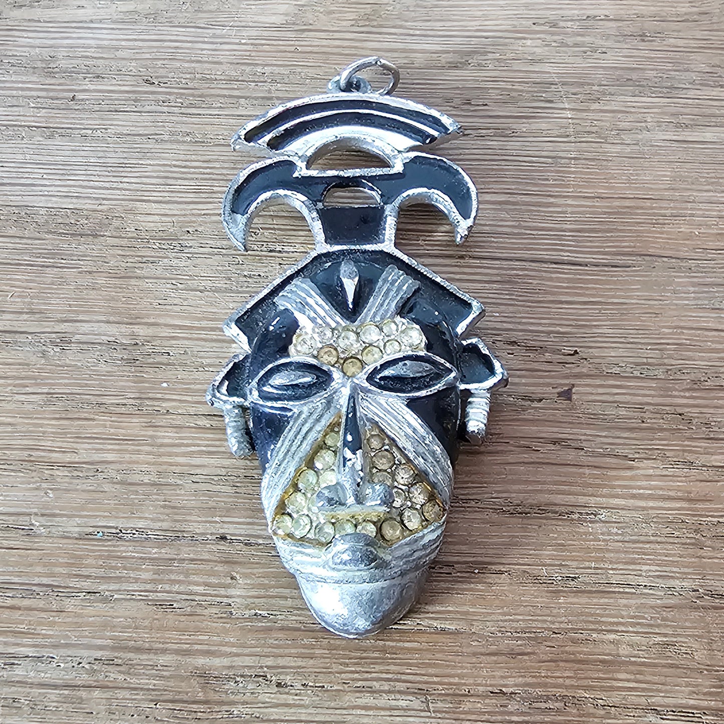 Vintage Coro Art Deco-style silver-tone & black enamel tribal mask pendant
