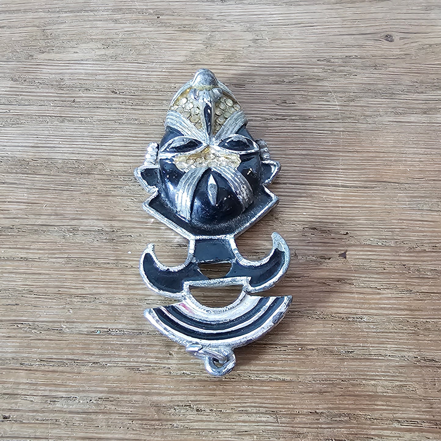 Vintage Coro Art Deco-style silver-tone & black enamel tribal mask pendant