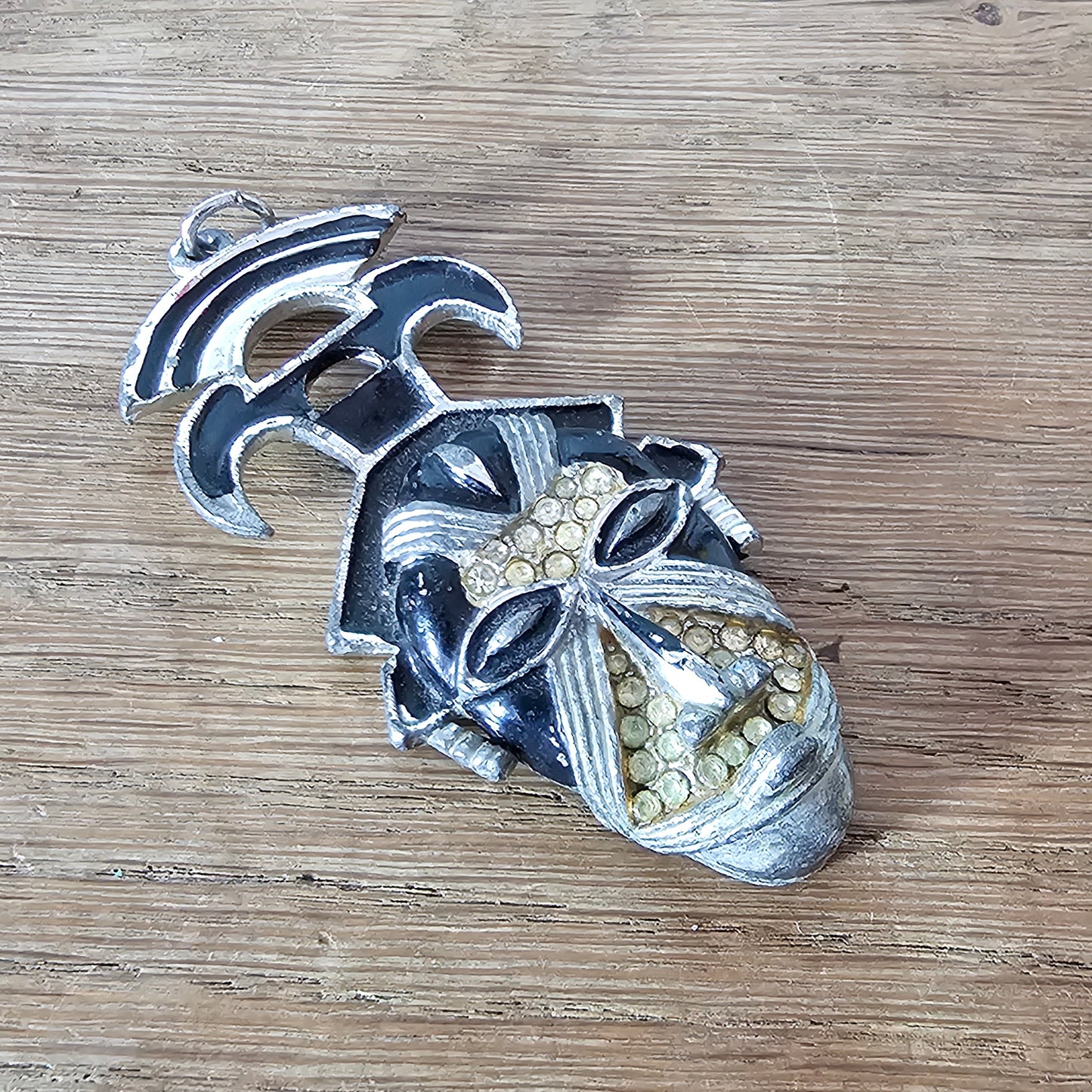 Vintage Coro Art Deco-style silver-tone & black enamel tribal mask pendant