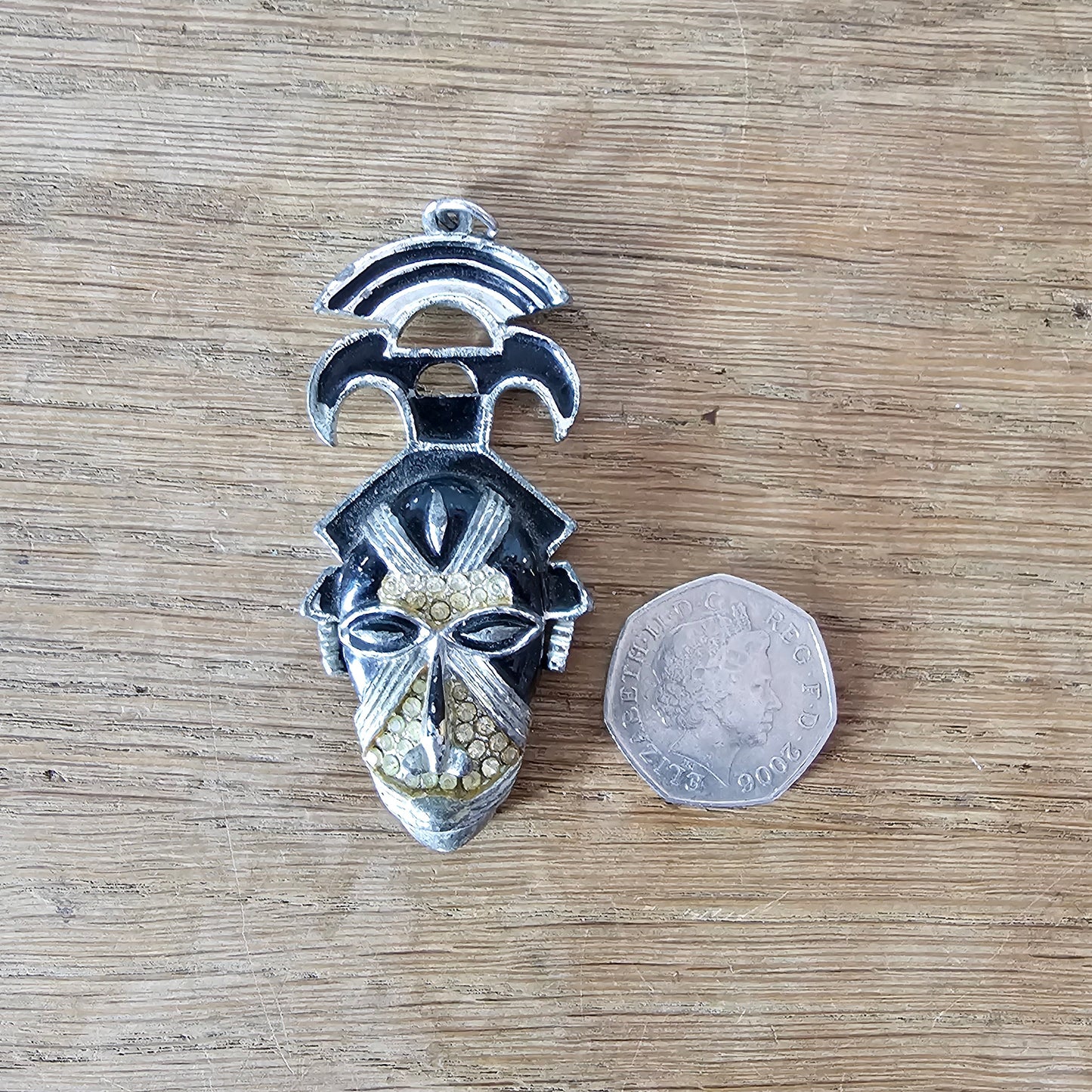 Vintage Coro Art Deco-style silver-tone & black enamel tribal mask pendant