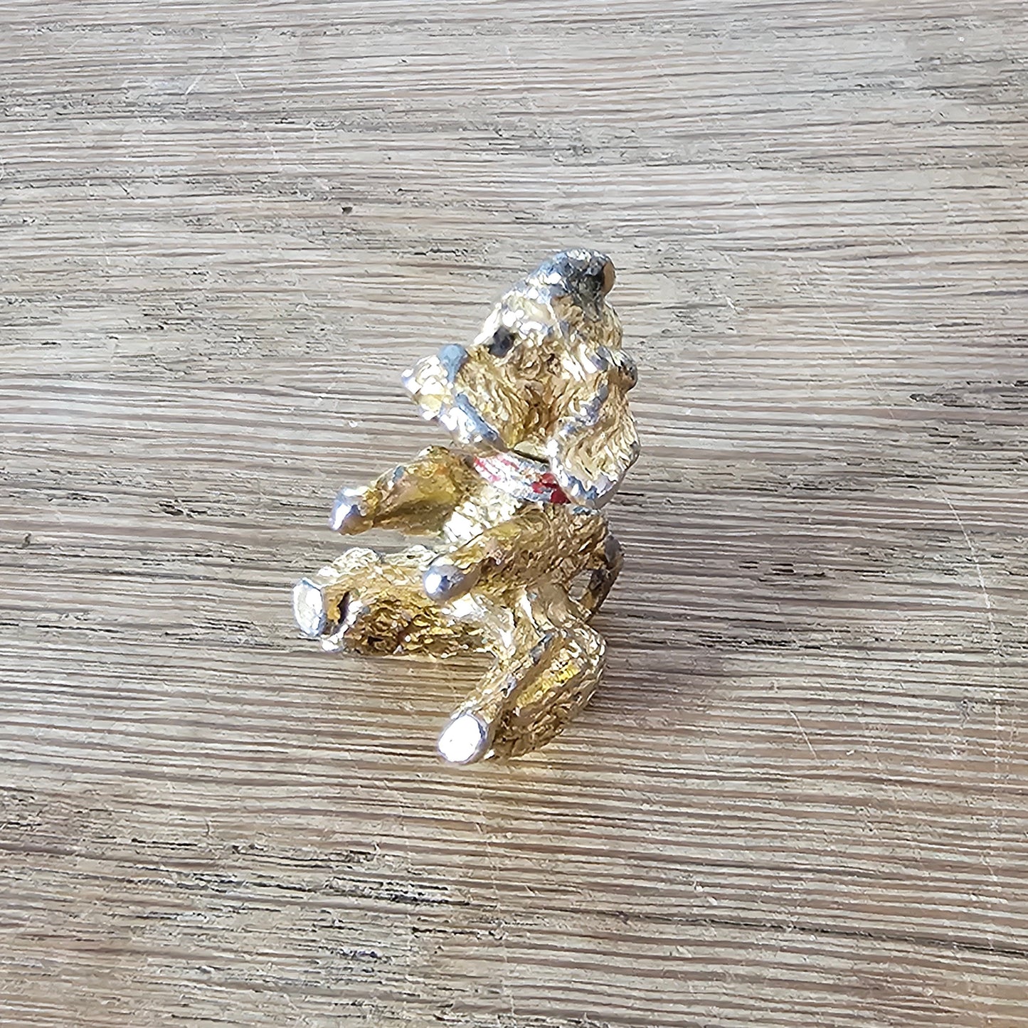 Vintage gold-tone begging French poodle pendant with red collar