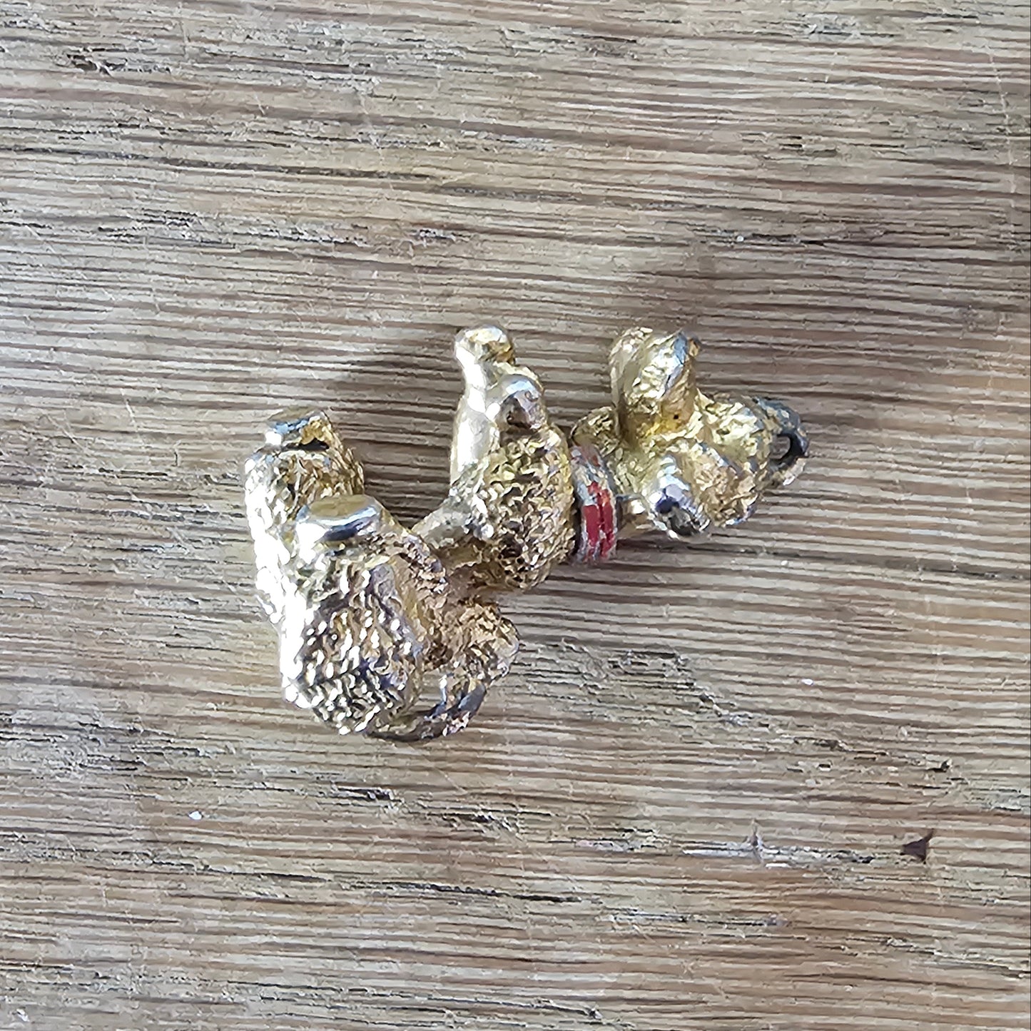 Vintage gold-tone begging French poodle pendant with red collar