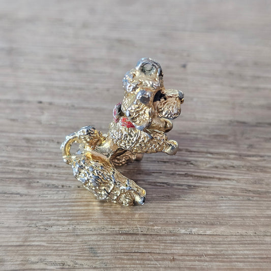 Vintage gold-tone begging French poodle pendant with red collar