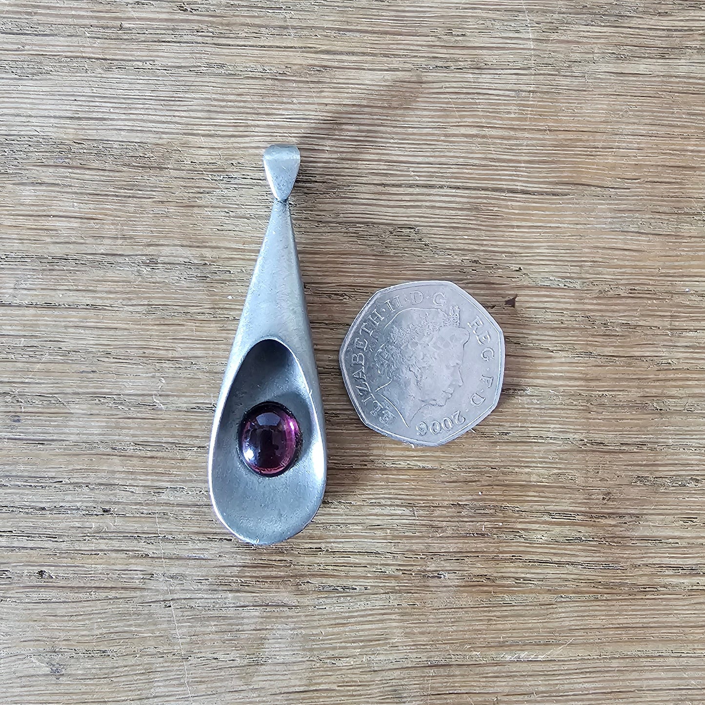1960s pewter pendant with amethyst glass cabochon
