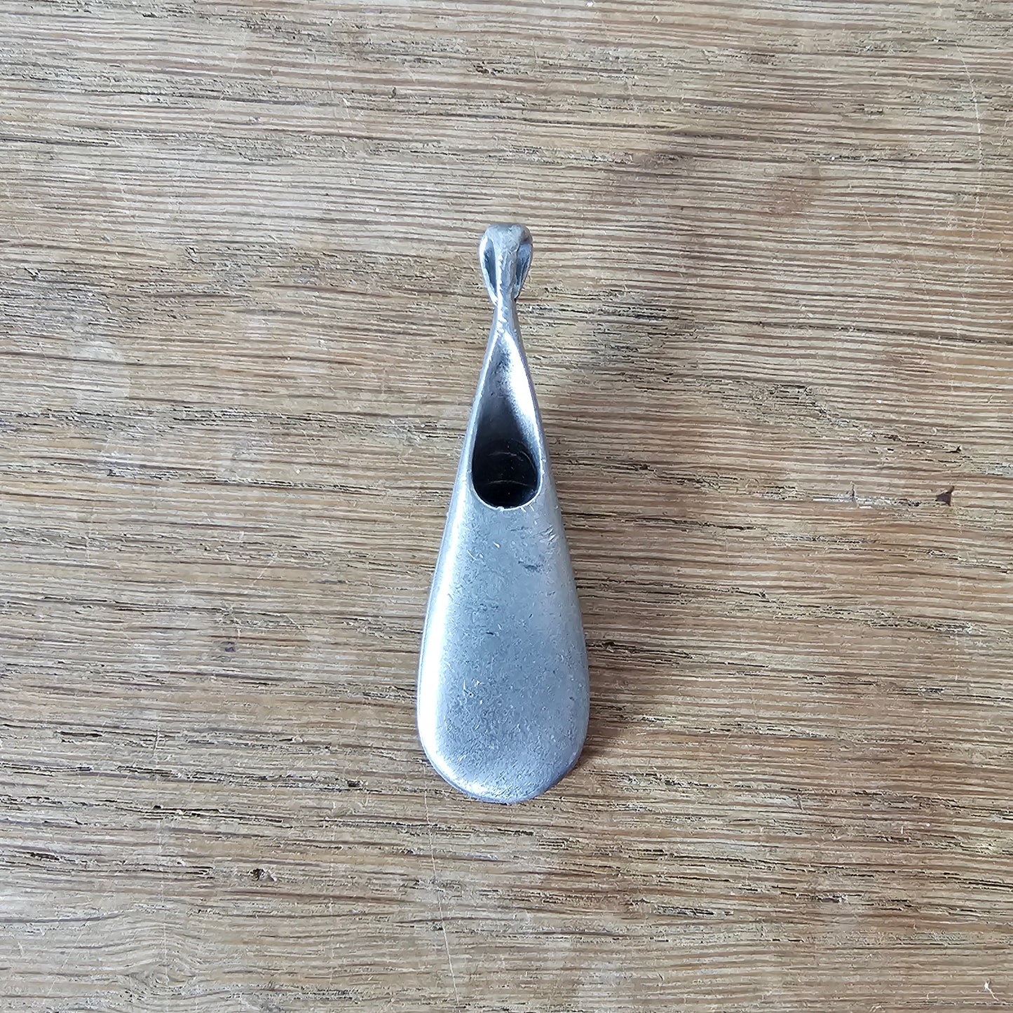 1960s pewter pendant with amethyst glass cabochon