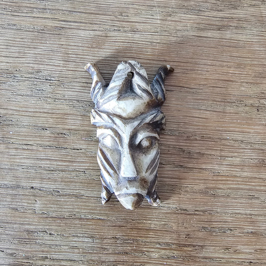 1970s carved bone tribal mask pendant african style tiki boho necklace