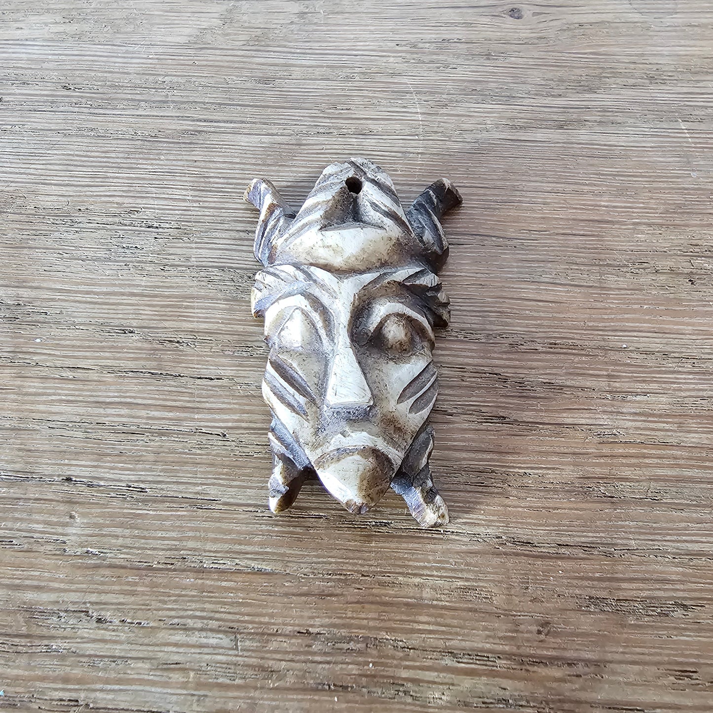 1970s carved bone tribal mask pendant african style tiki boho necklace