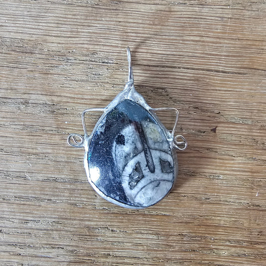 1970s/80s orthoceras fossil stone pendant in hand-crafted metal setting