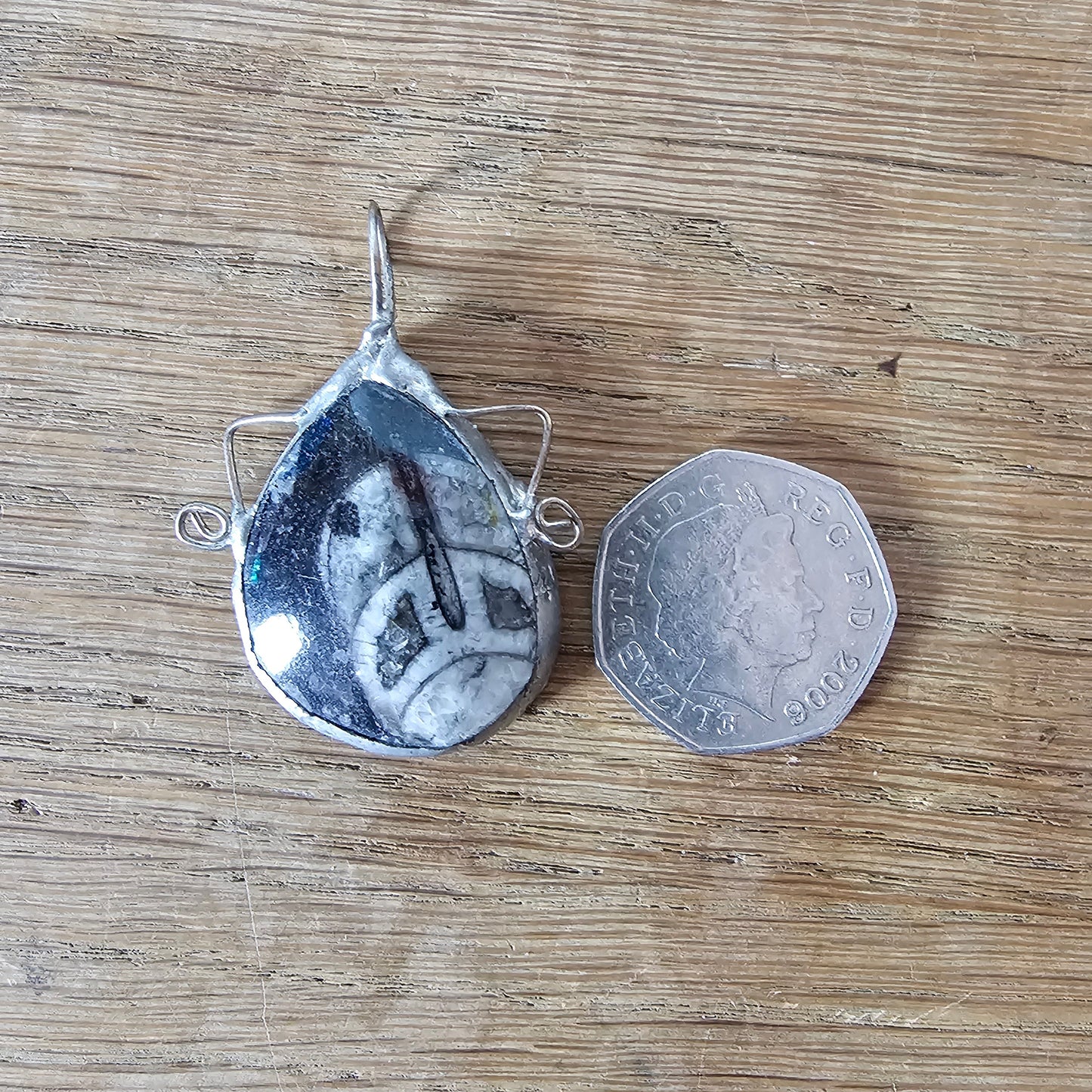 1970s/80s orthoceras fossil stone pendant in hand-crafted metal setting