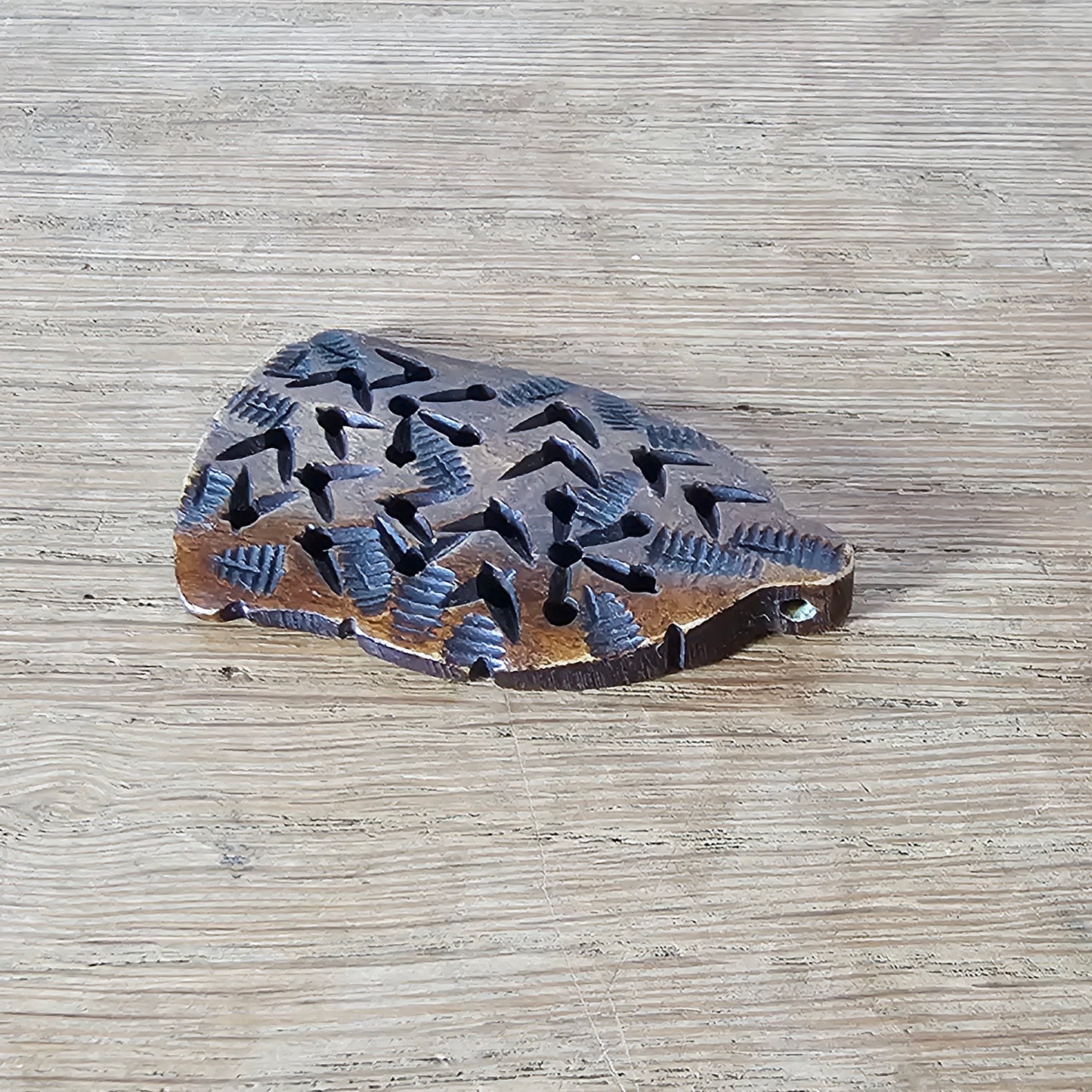 1970s/80s hand-carved wooden pendant with rustic pierced design