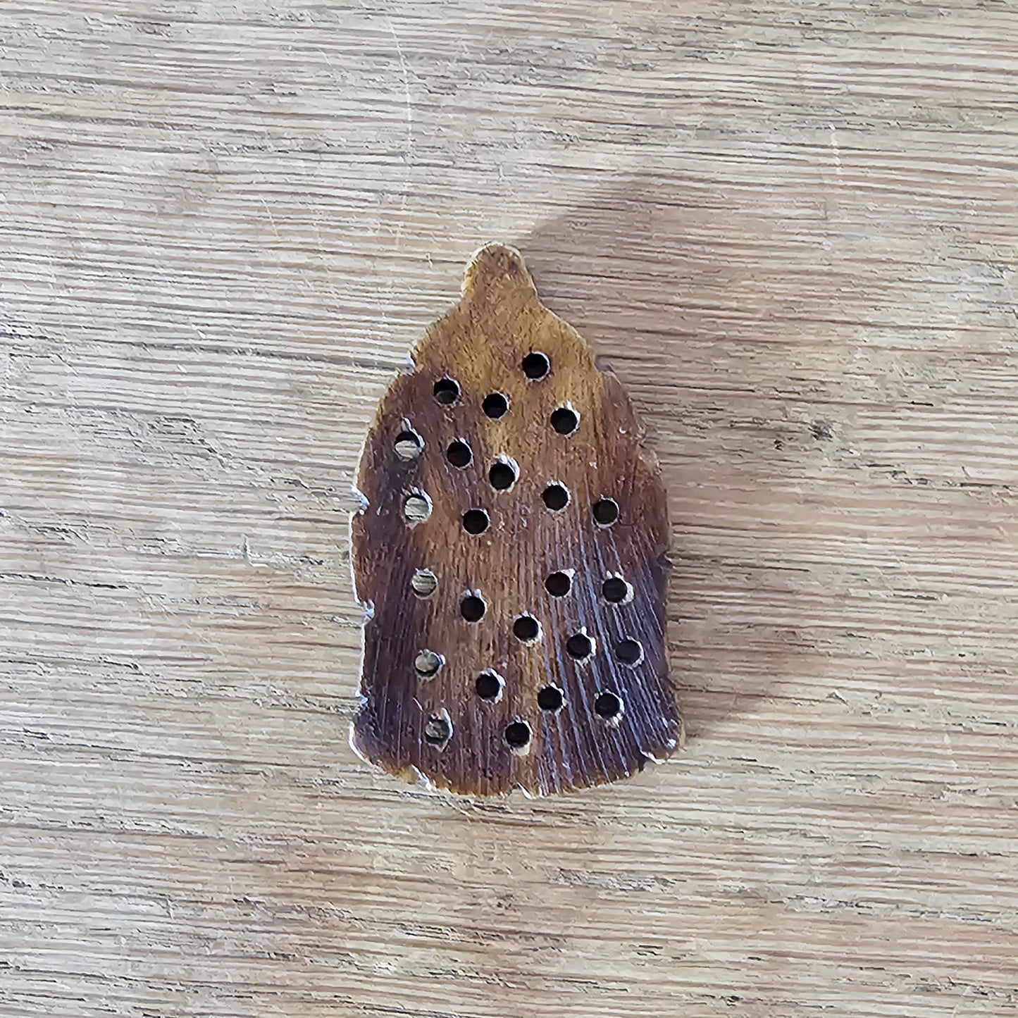 1970s/80s hand-carved wooden pendant with rustic pierced design