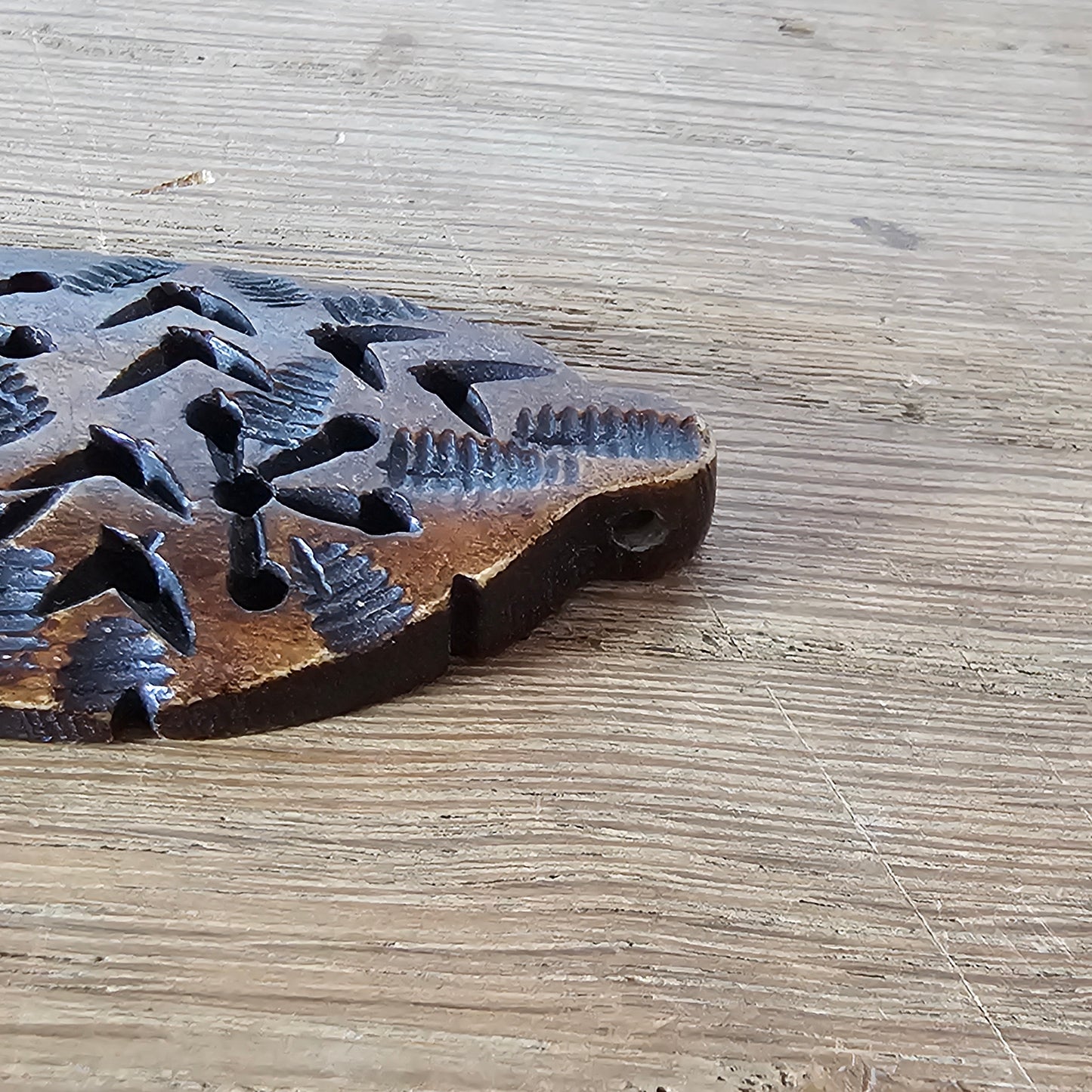 1970s/80s hand-carved wooden pendant with rustic pierced design