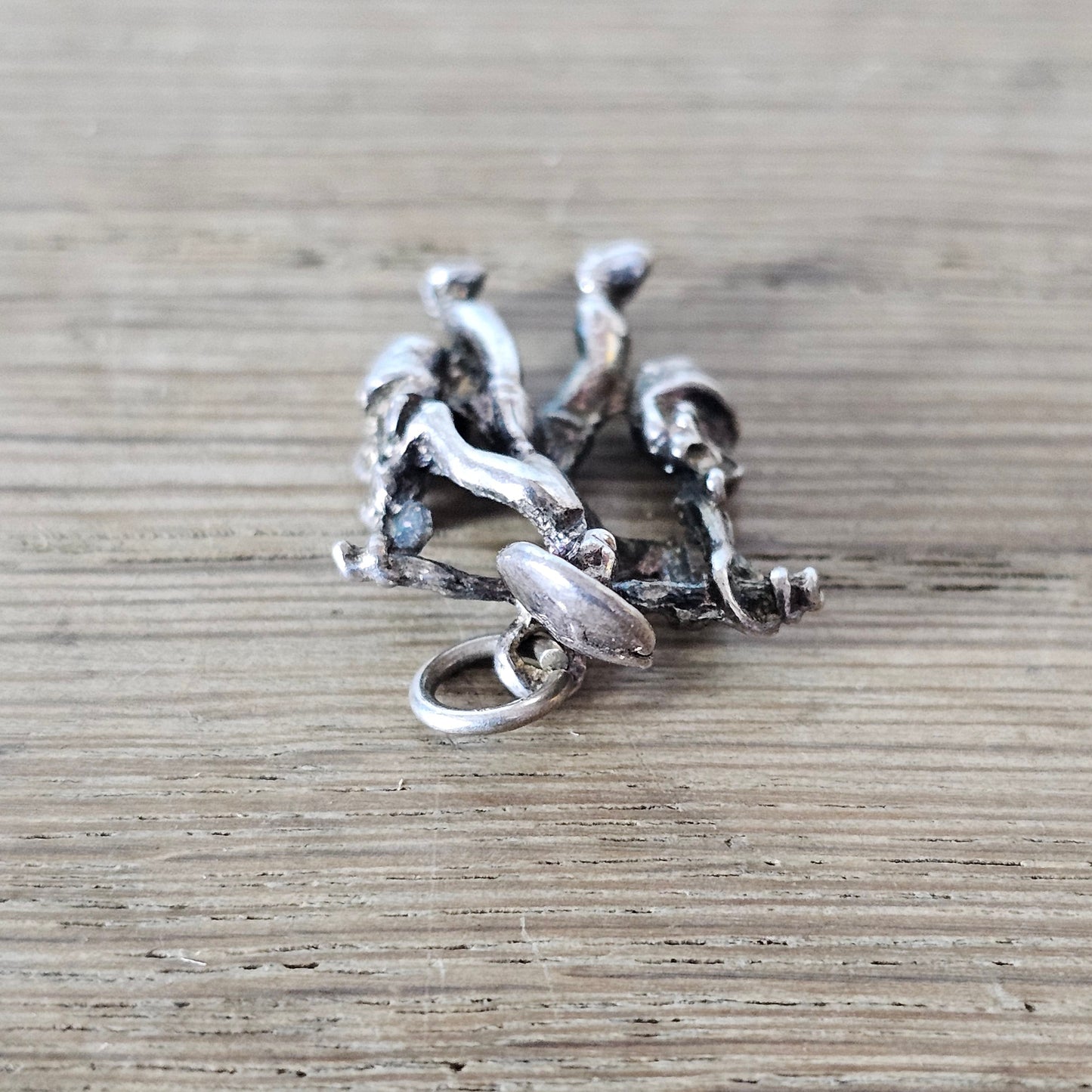circa. 1970s silver-tone figural water carrier charm