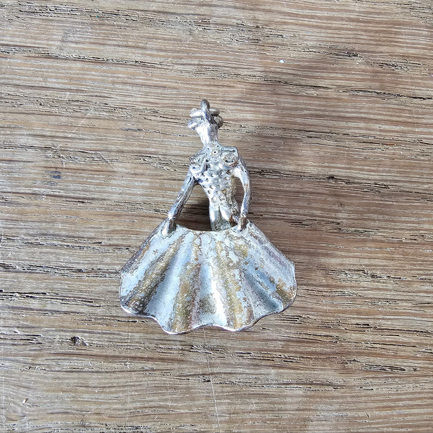 Mid-century silver-tone figural matador charm
