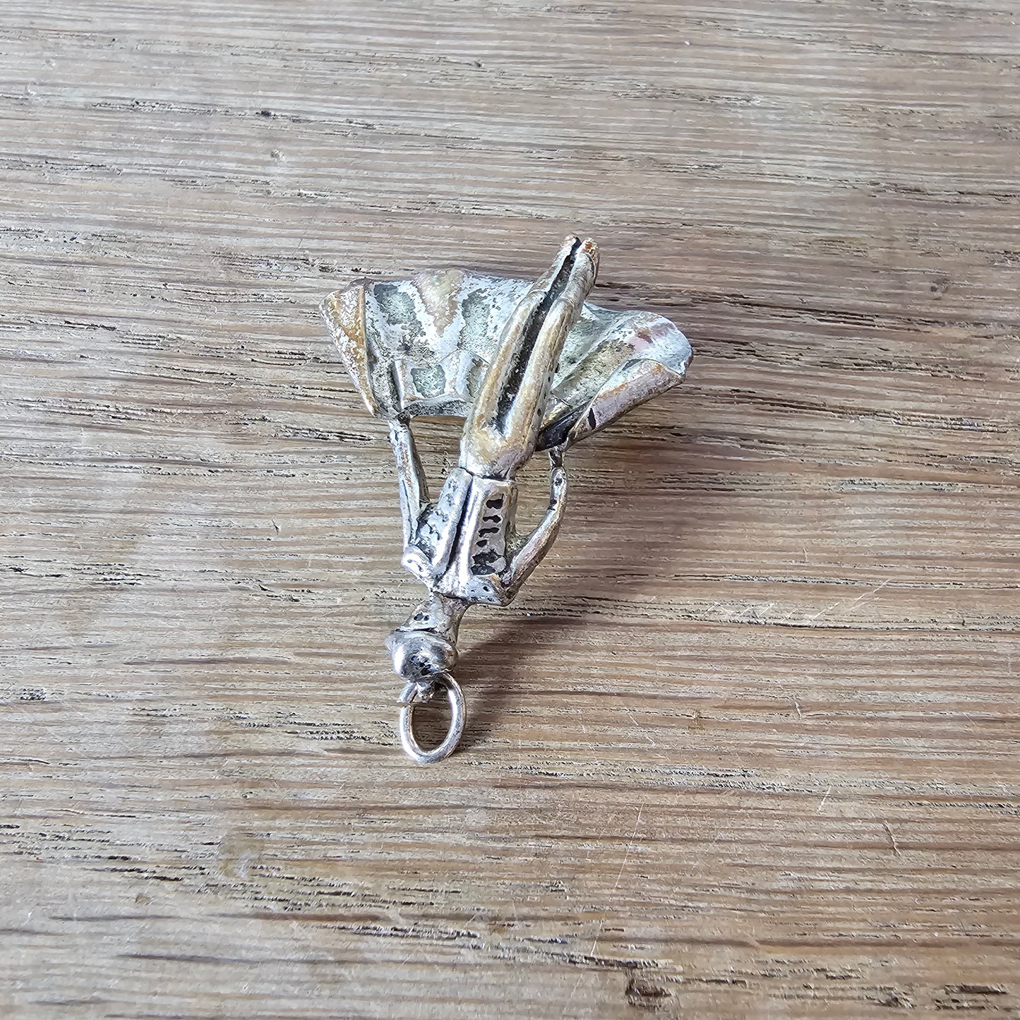 Mid-century silver-tone figural matador charm