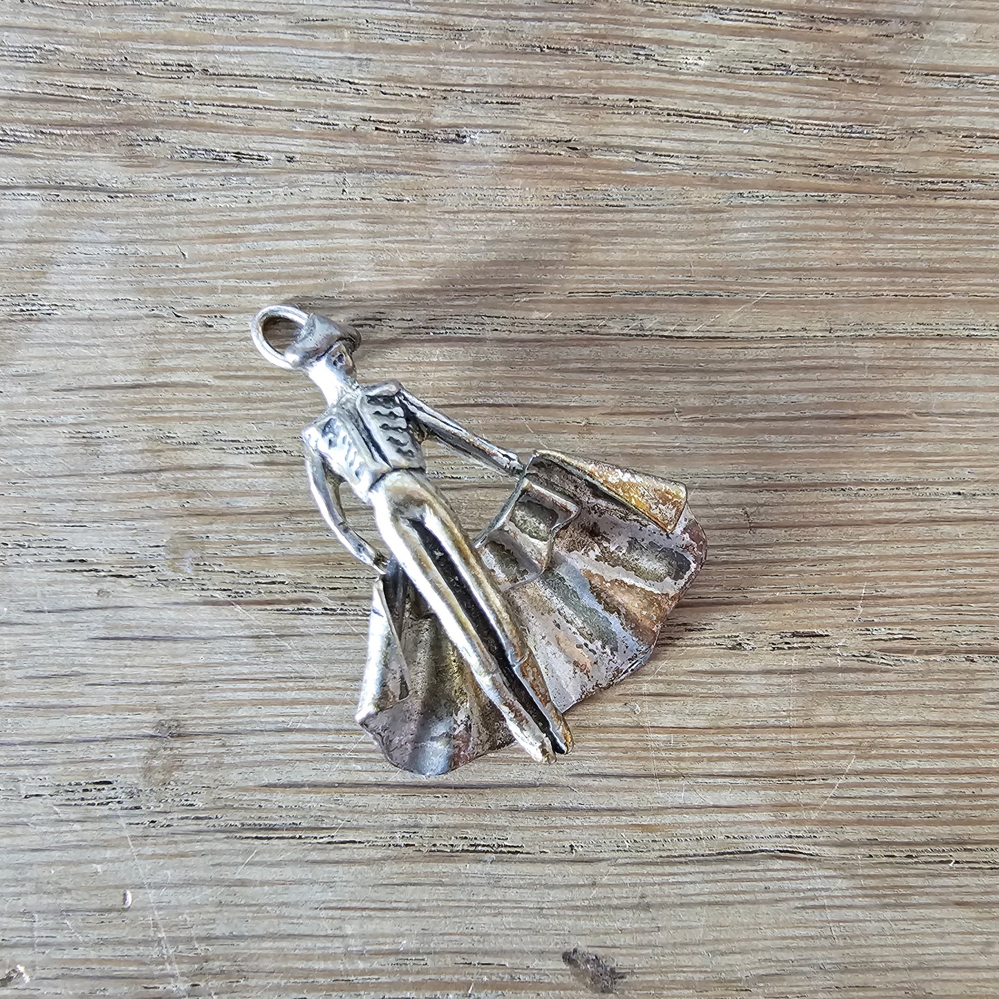 Mid-century silver-tone figural matador charm