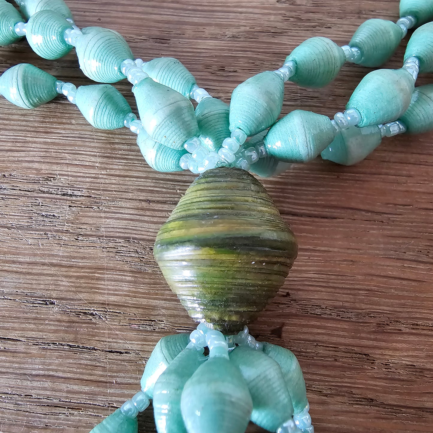 1970s seafoam green paper bead triple-strand necklace with tassel drop