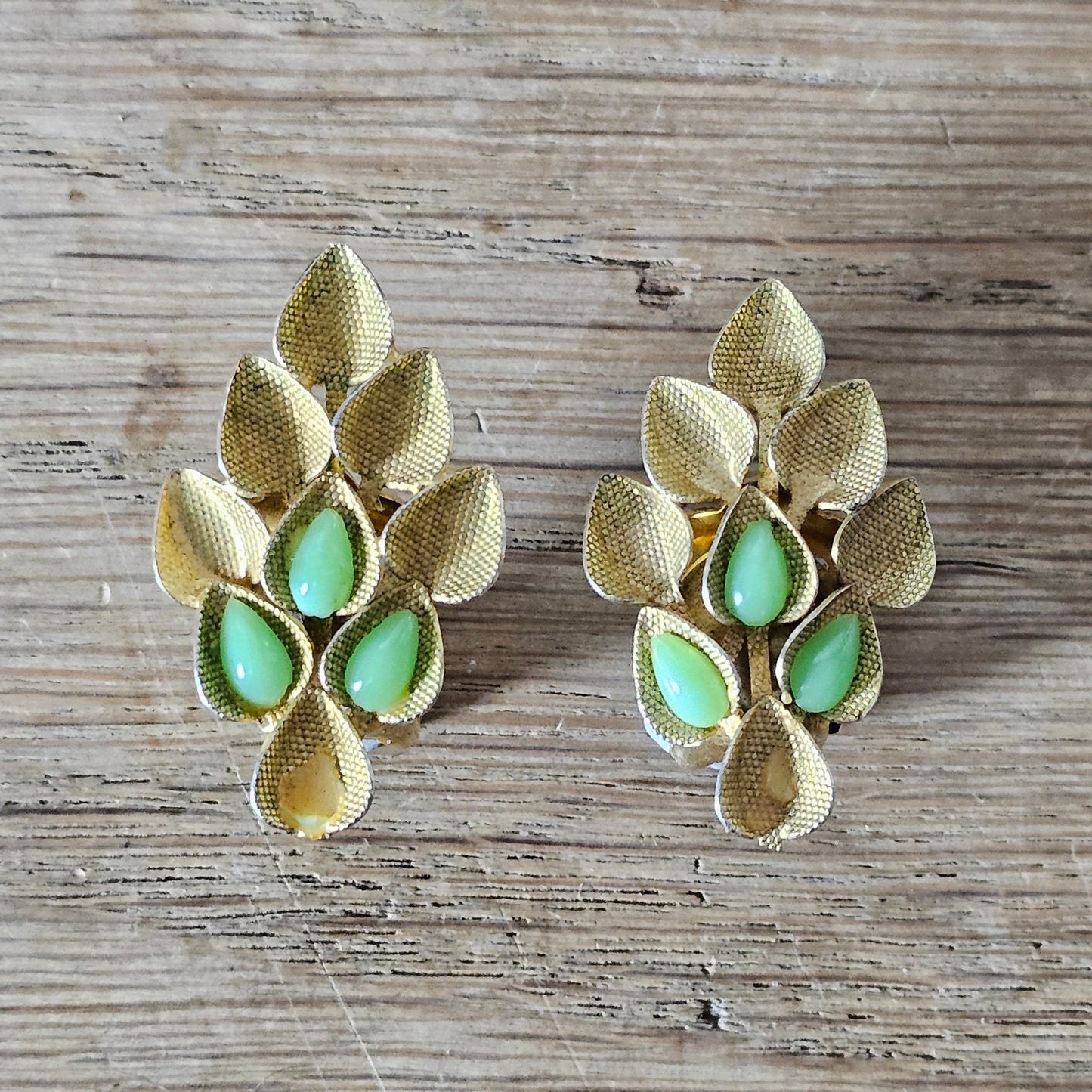 1960s Austrian gold-tone leaf & green glass cabochon clip-on earrings