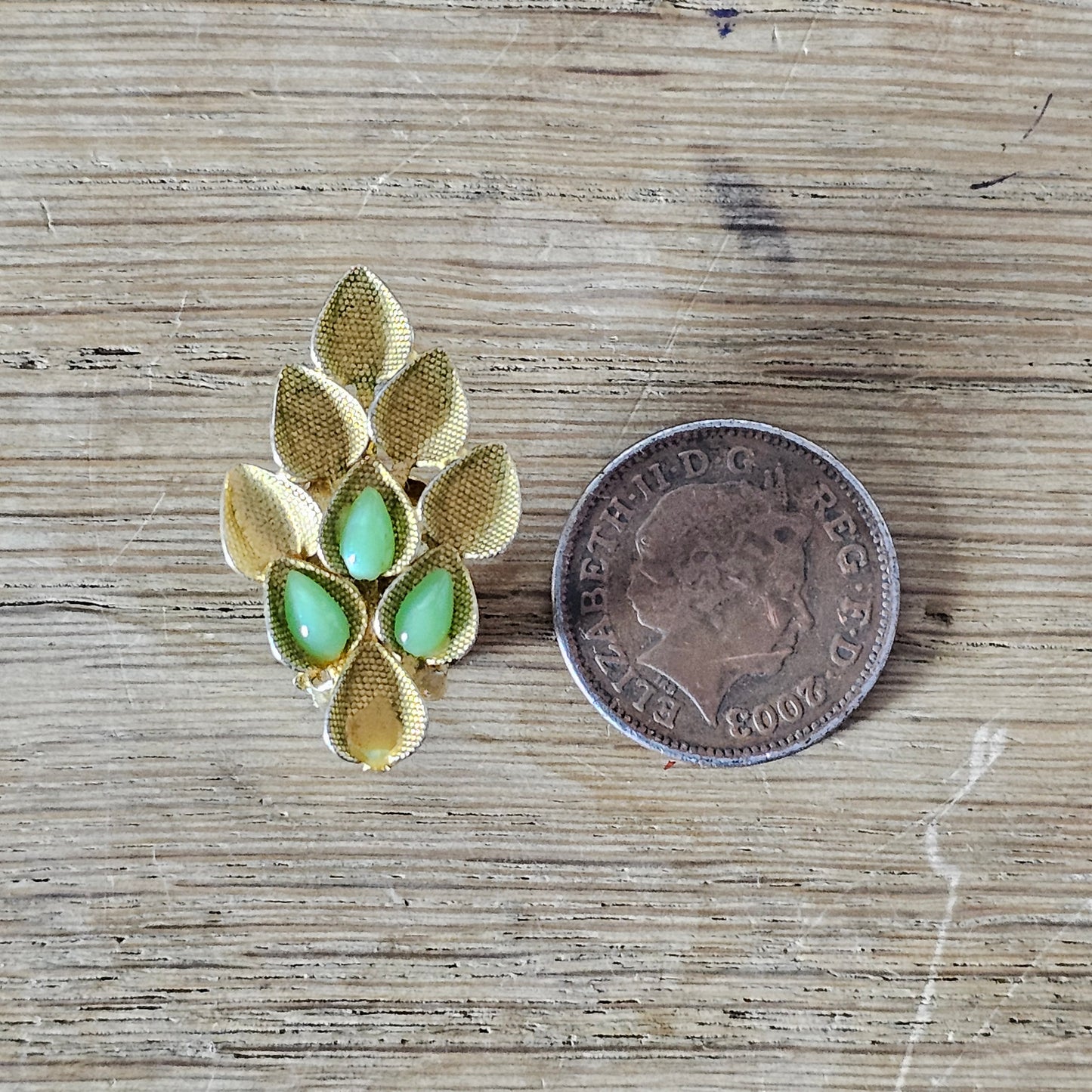 1960s Austrian gold-tone leaf & green glass cabochon clip-on earrings