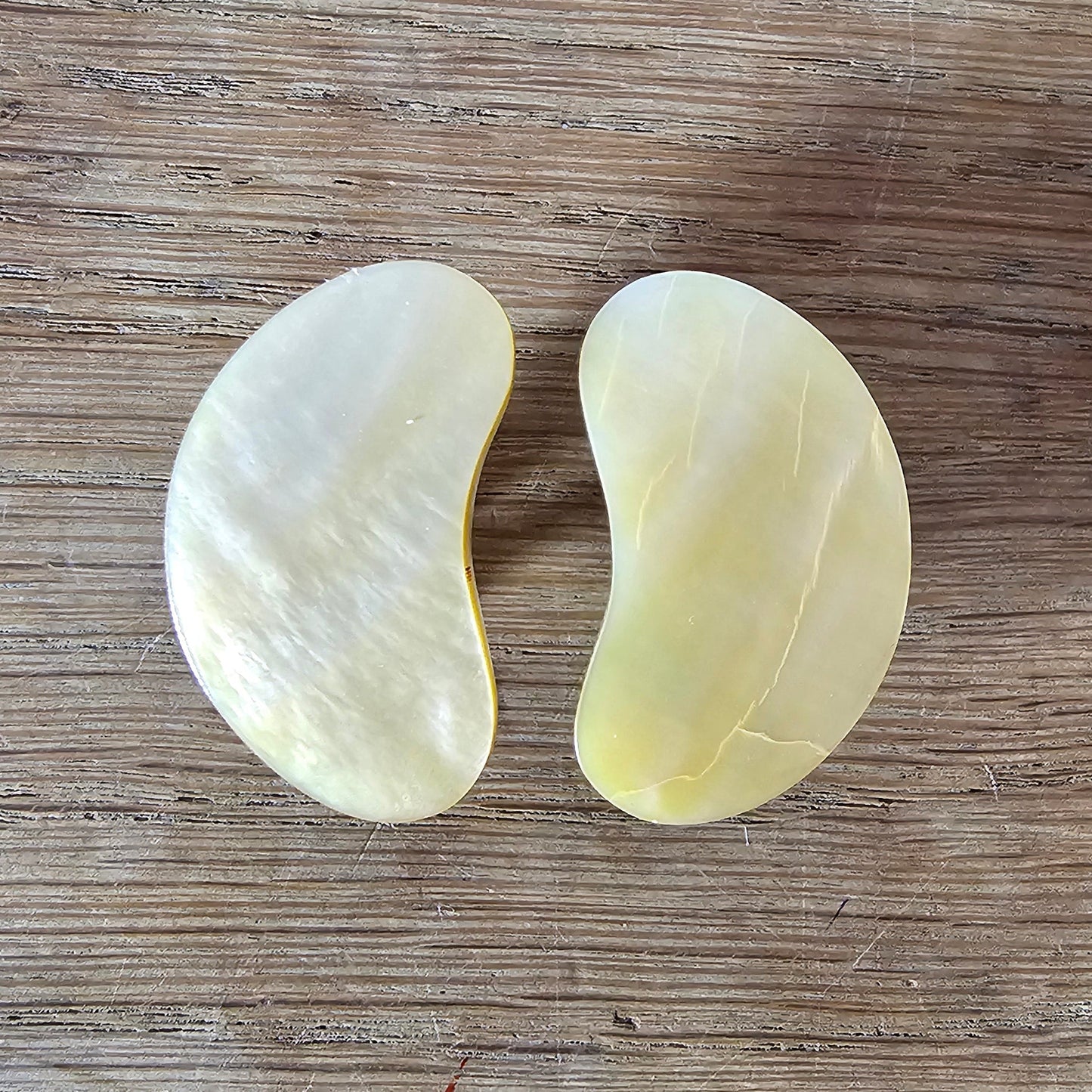 1960s Mother of Pearl kidney bean shaped clip-on earrings