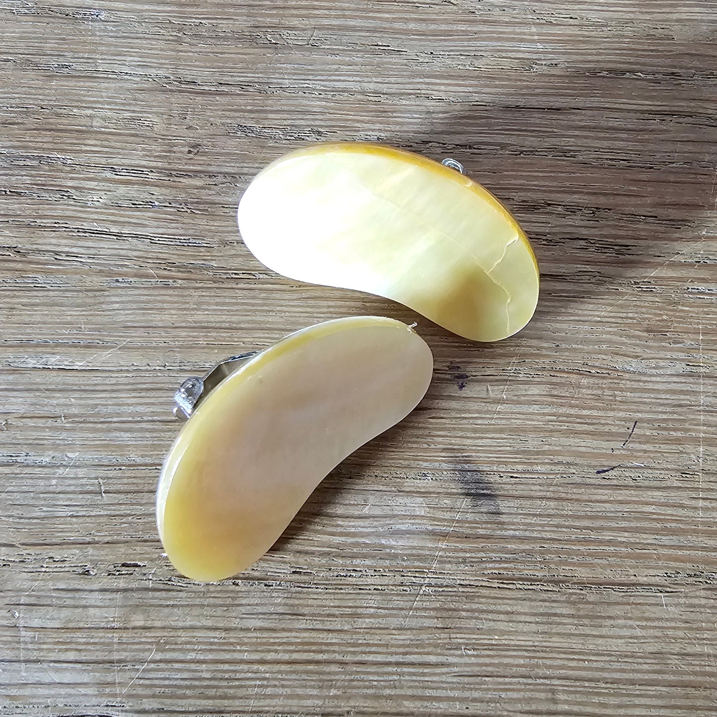 1960s Mother of Pearl kidney bean shaped clip-on earrings
