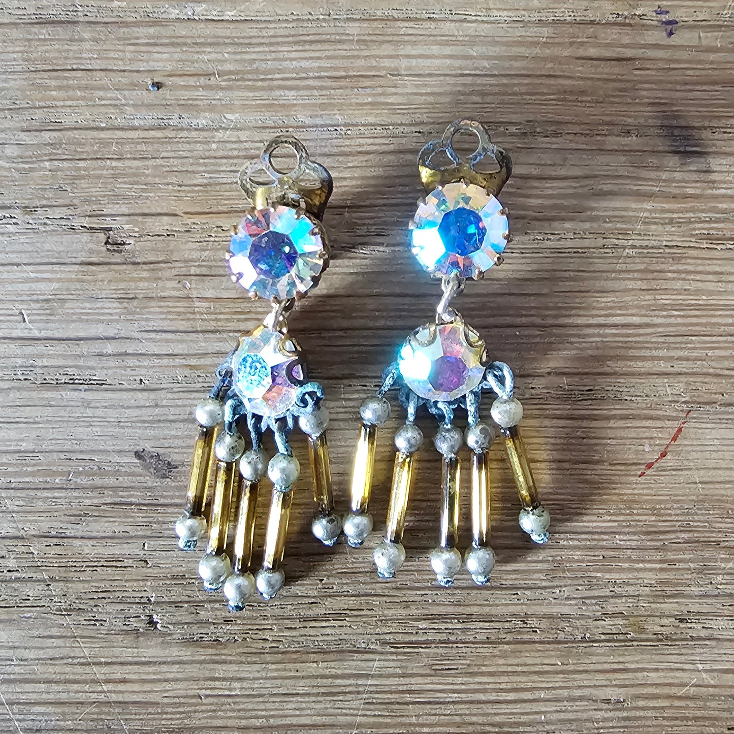 1960s Aurora Borealis rhinestone & amber bugle bead drop clip-on earrings