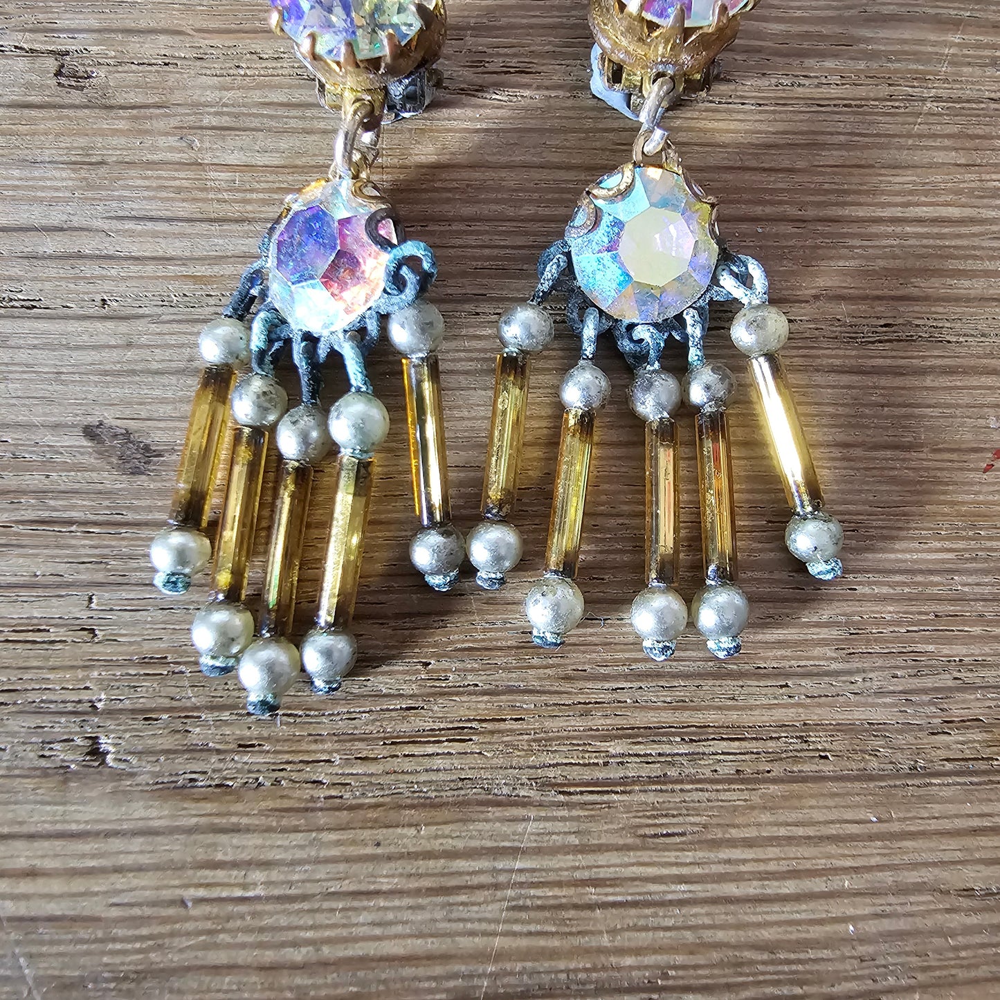 1960s Aurora Borealis rhinestone & amber bugle bead drop clip-on earrings