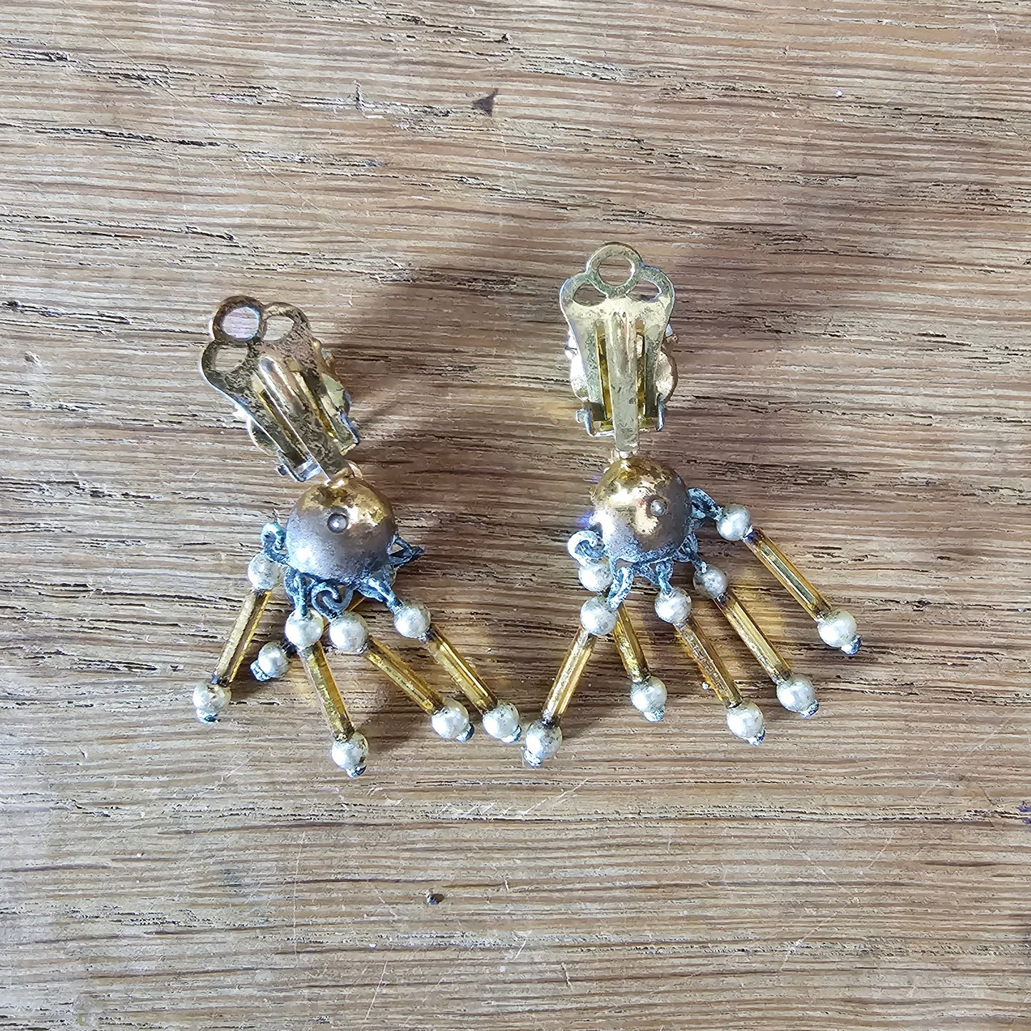 1960s Aurora Borealis rhinestone & amber bugle bead drop clip-on earrings
