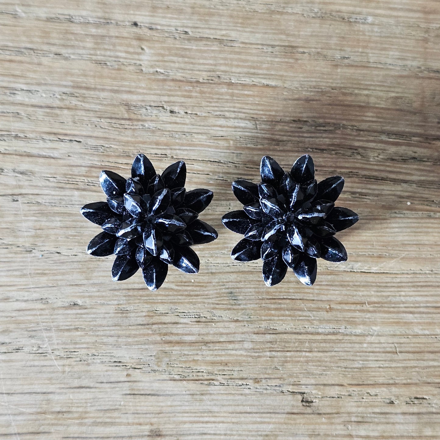 1950s black plastic three dimensional star-shaped clip-on earrings