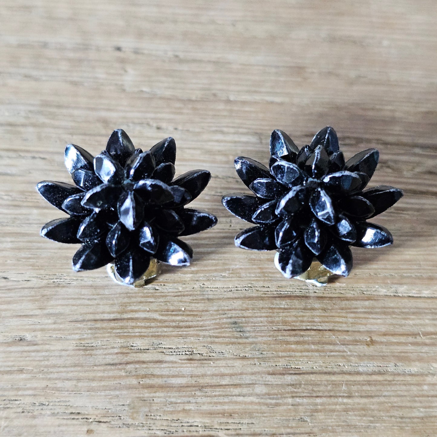 1950s black plastic three dimensional star-shaped clip-on earrings