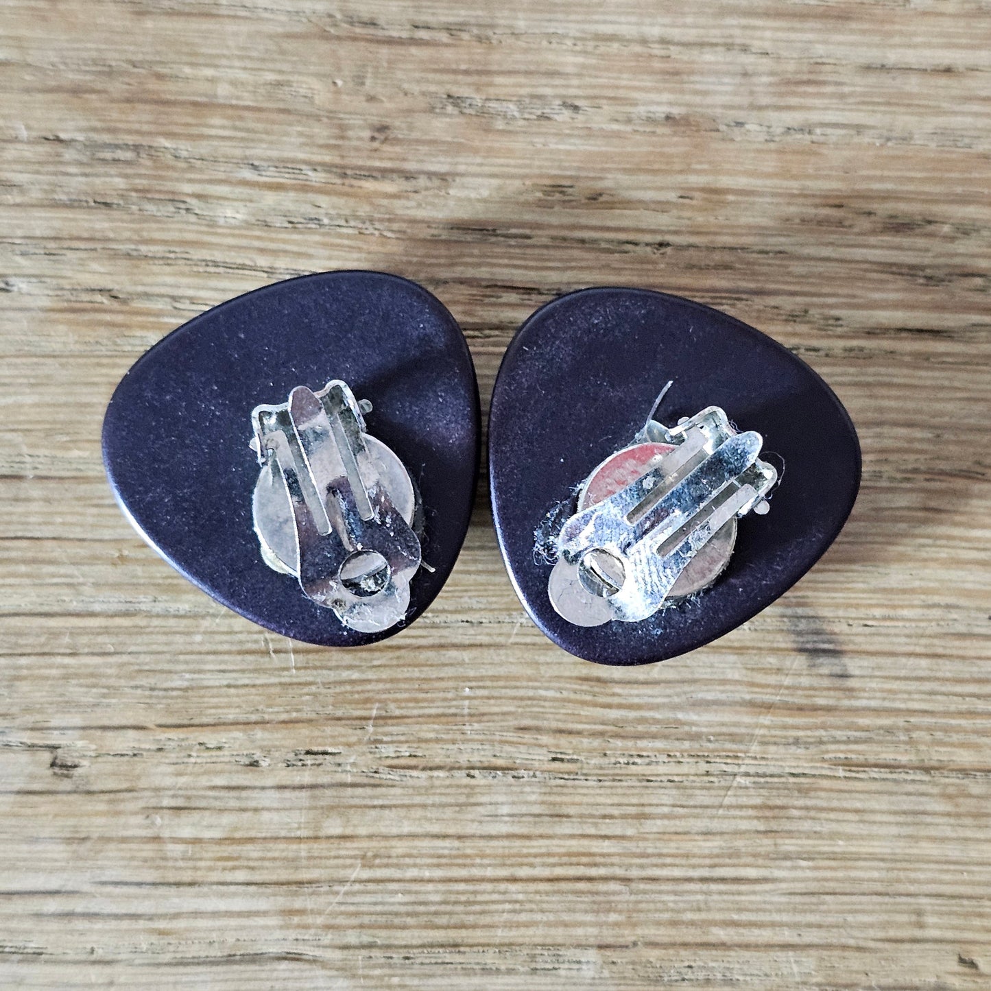 1980s black & gold-tone clip-on earrings with iridescent green cabochon centre