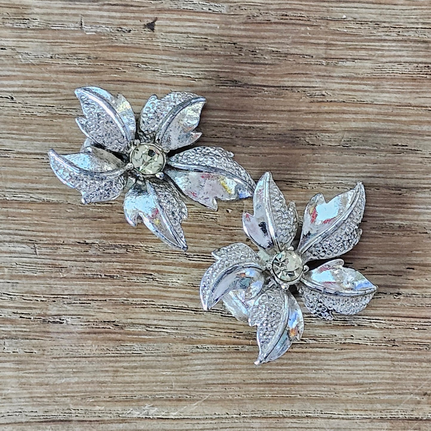 Late 1950s silver-tone & rhinestone textured flower clip-on earrings