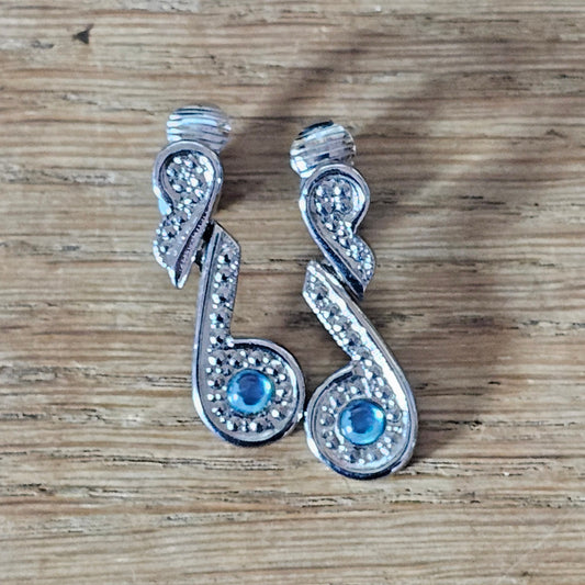 circa. 1960s silver-tone marcasite-style blue rhinestone drop clip-on earrings