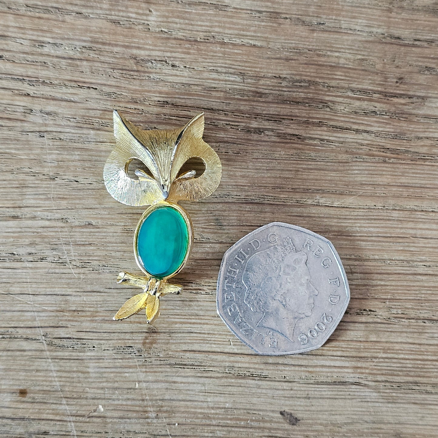 1980s Liz Clairborne modernist-style gold-tone owl brooch with green cabochon belly