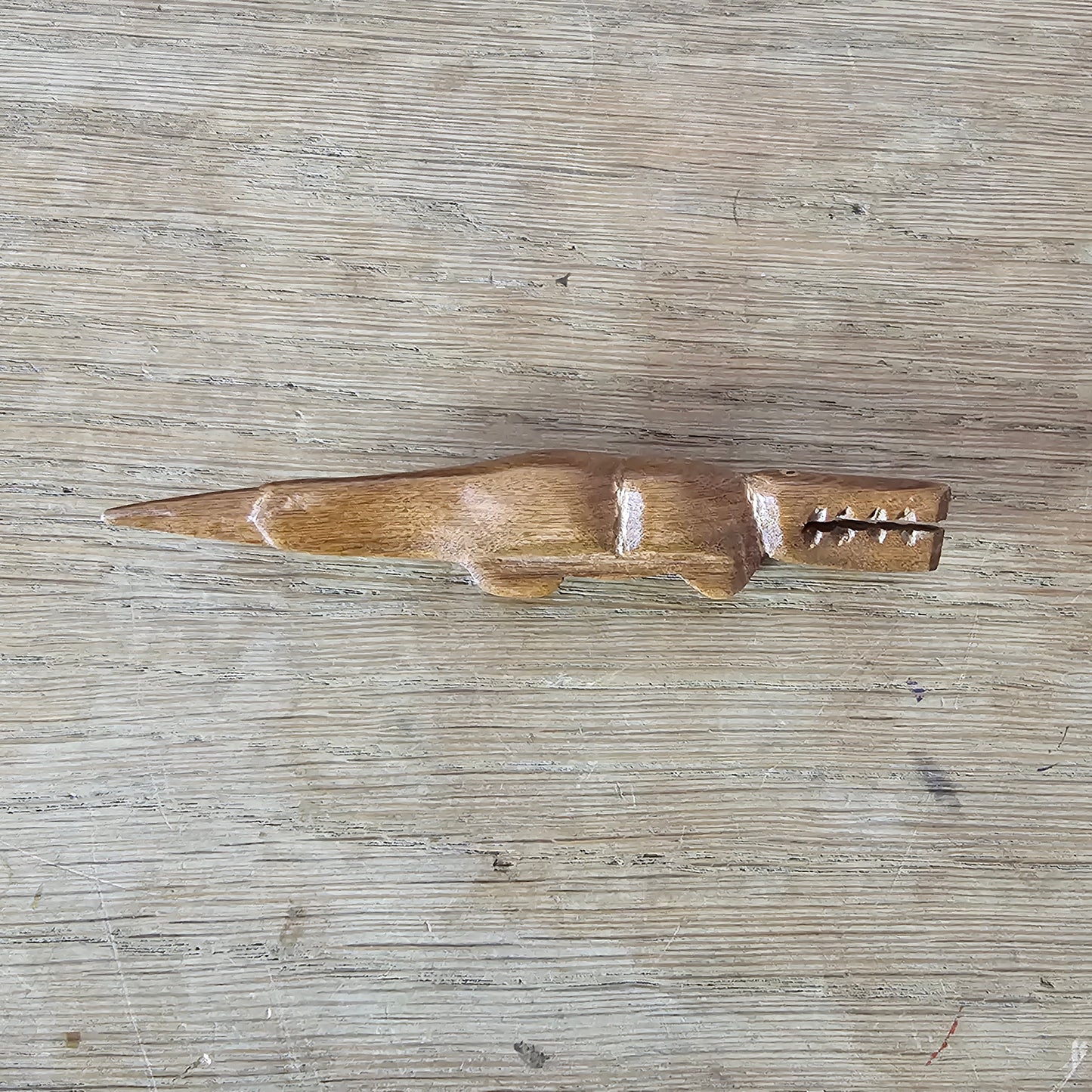 Home-made brooch using vintage wooden crocodile figurine