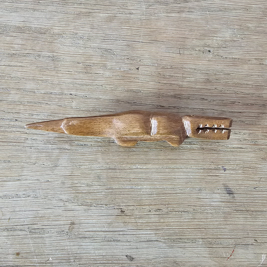 Home-made brooch using vintage wooden crocodile figurine