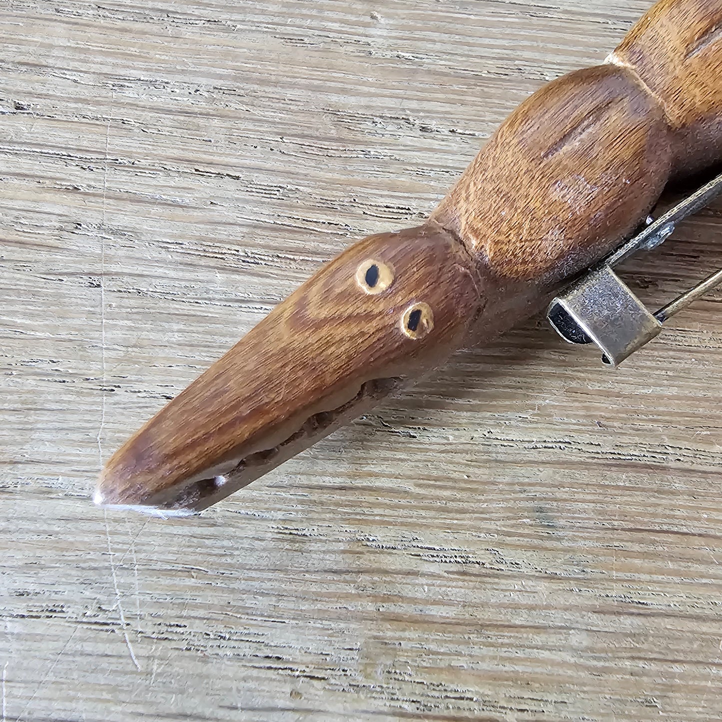 Home-made brooch using vintage wooden crocodile figurine