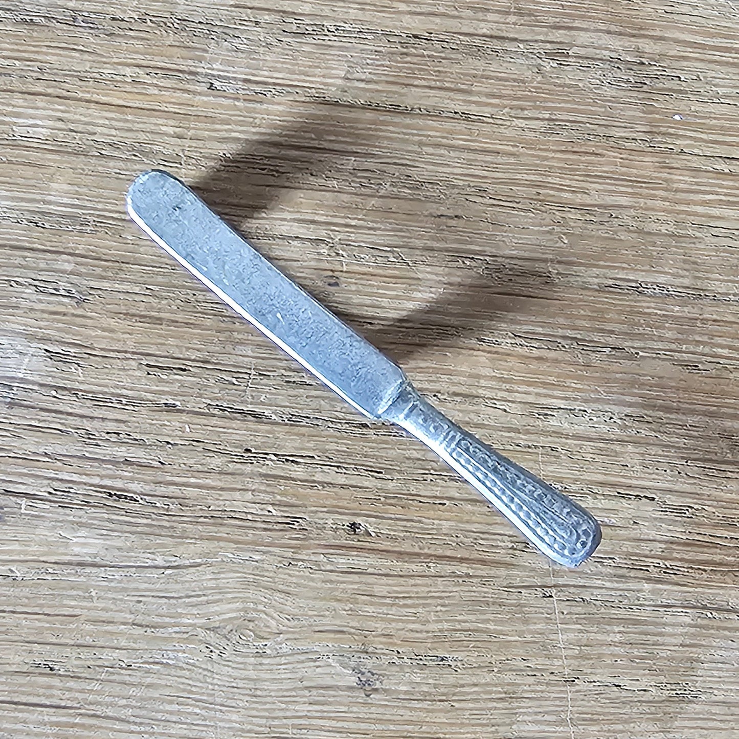 Home-made brooch using vintage minature butter knife