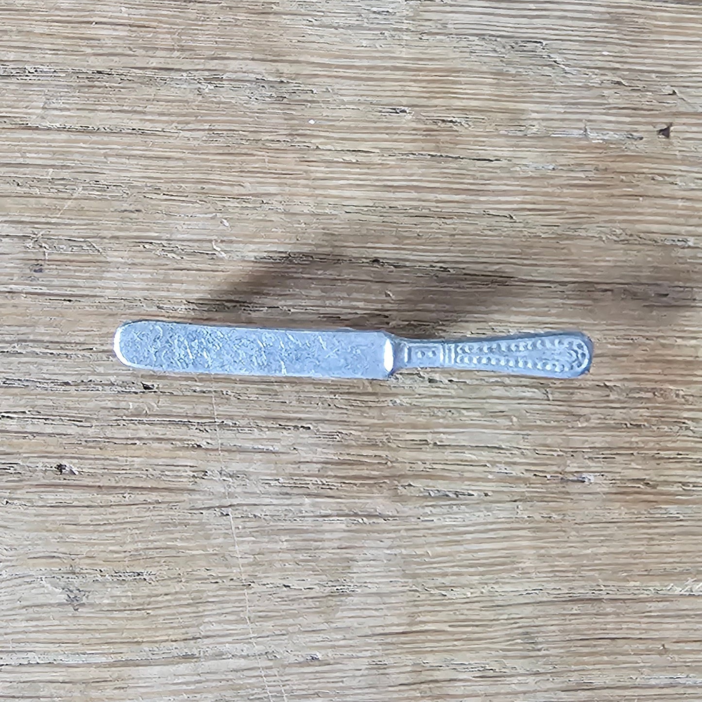 Home-made brooch using vintage minature butter knife