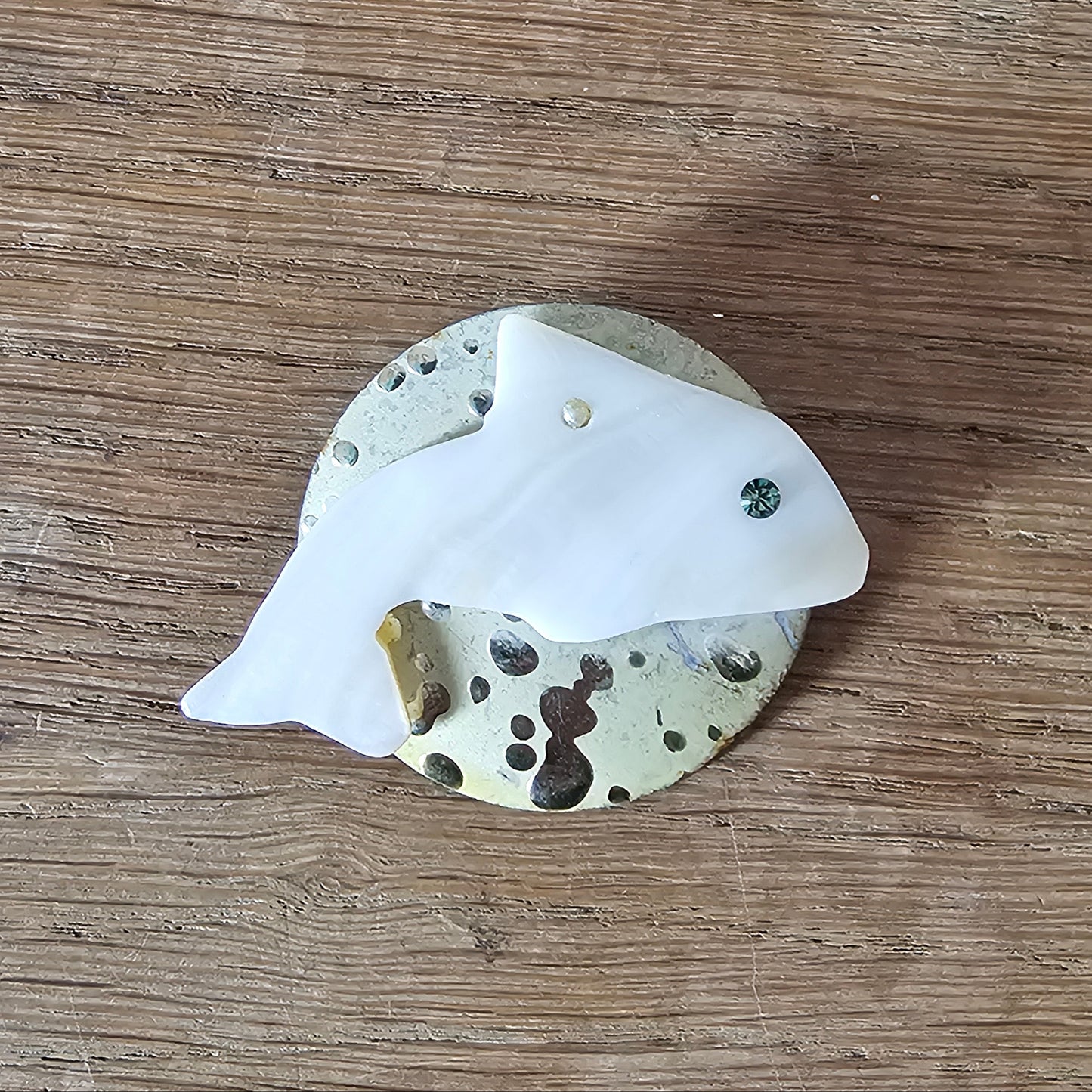 Home-made brooch using vintage Mother of Pearl fish & metal patterned disc earring back