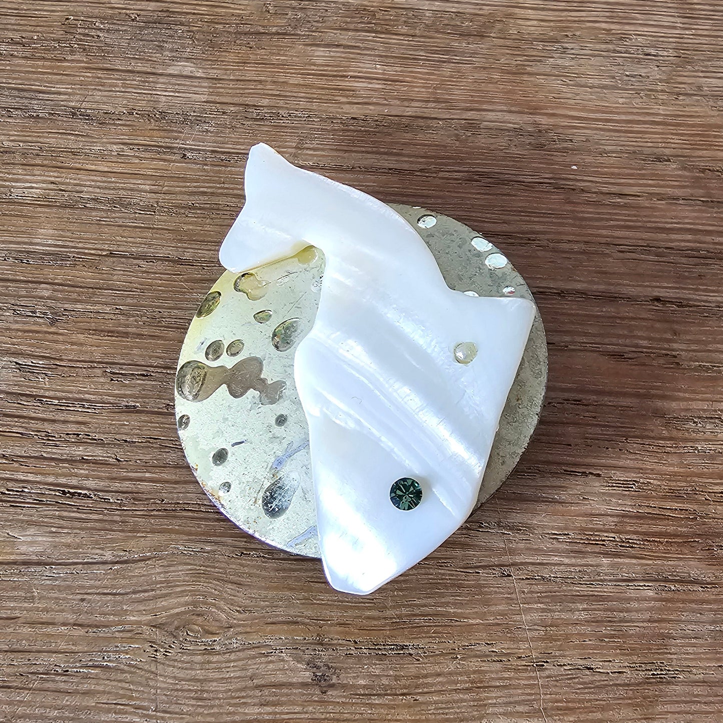 Home-made brooch using vintage Mother of Pearl fish & metal patterned disc earring back