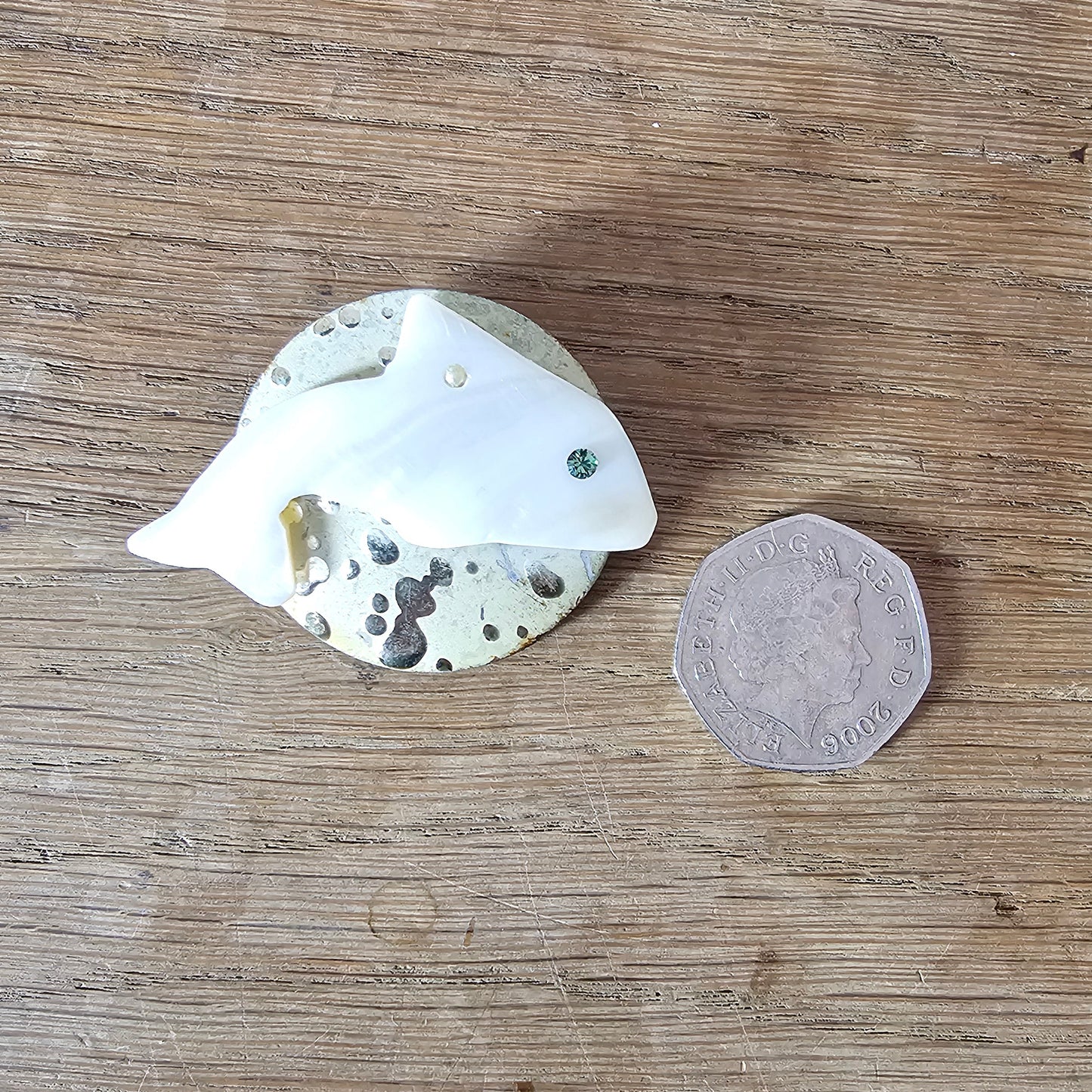 Home-made brooch using vintage Mother of Pearl fish & metal patterned disc earring back