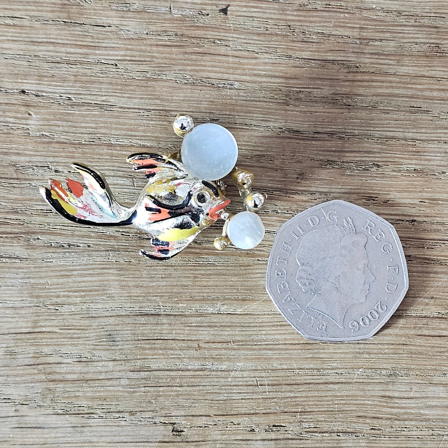 1950s gold-tone & enamel fish brooch with Mother of Pearl bubbles