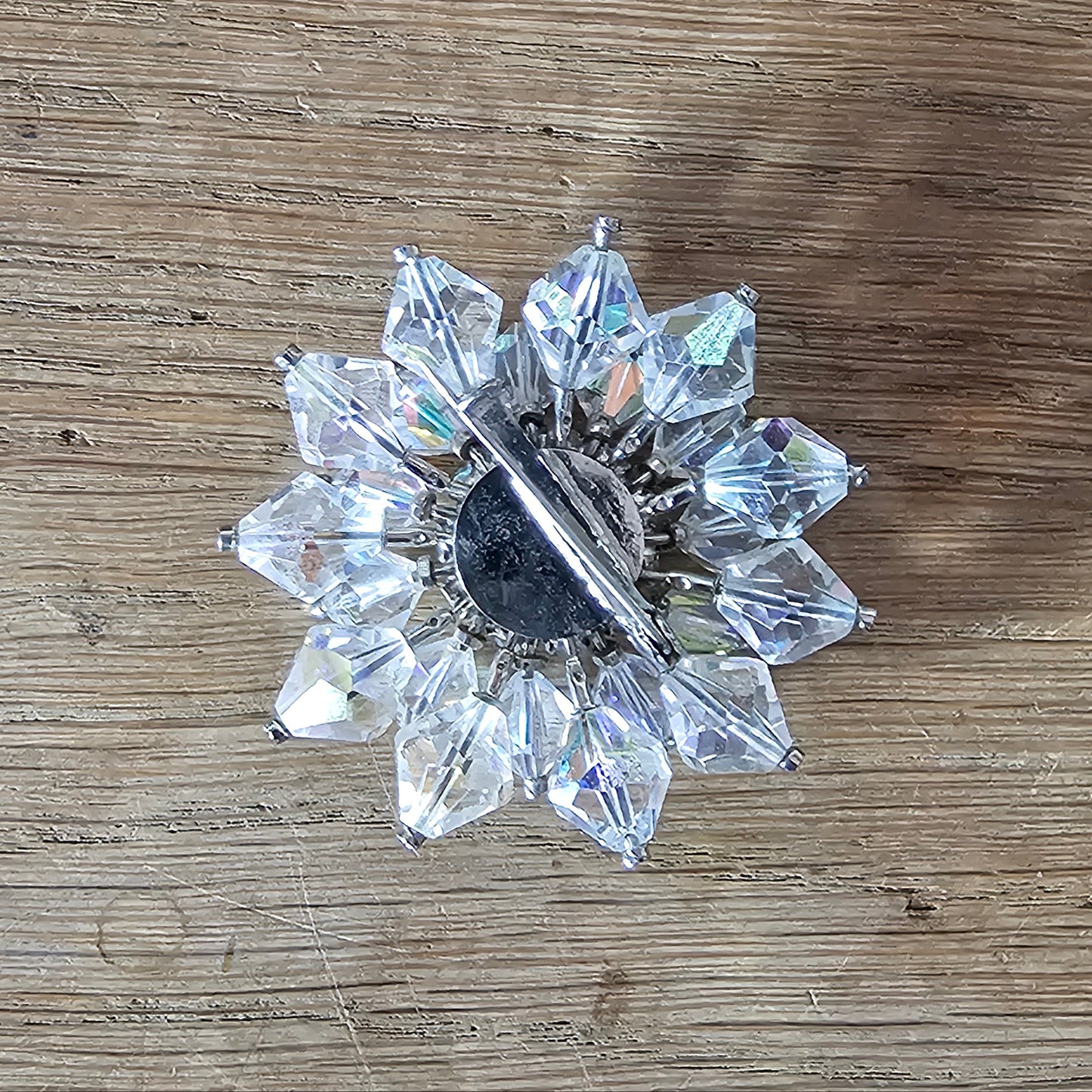 1950s Aurora Borealis crystal starburst brooch