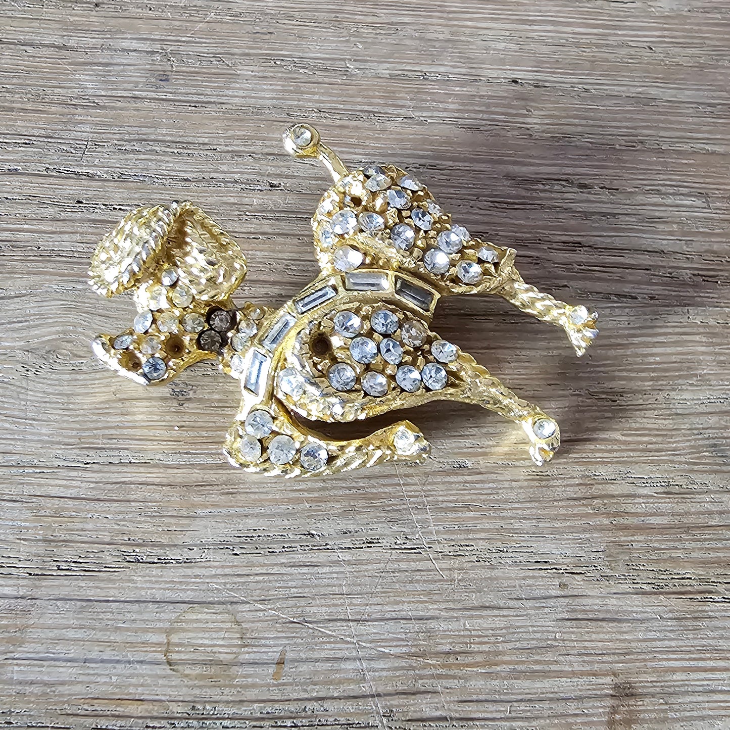 1960s gold-tone & rhinestone prancing French Poodle figural dog brooch