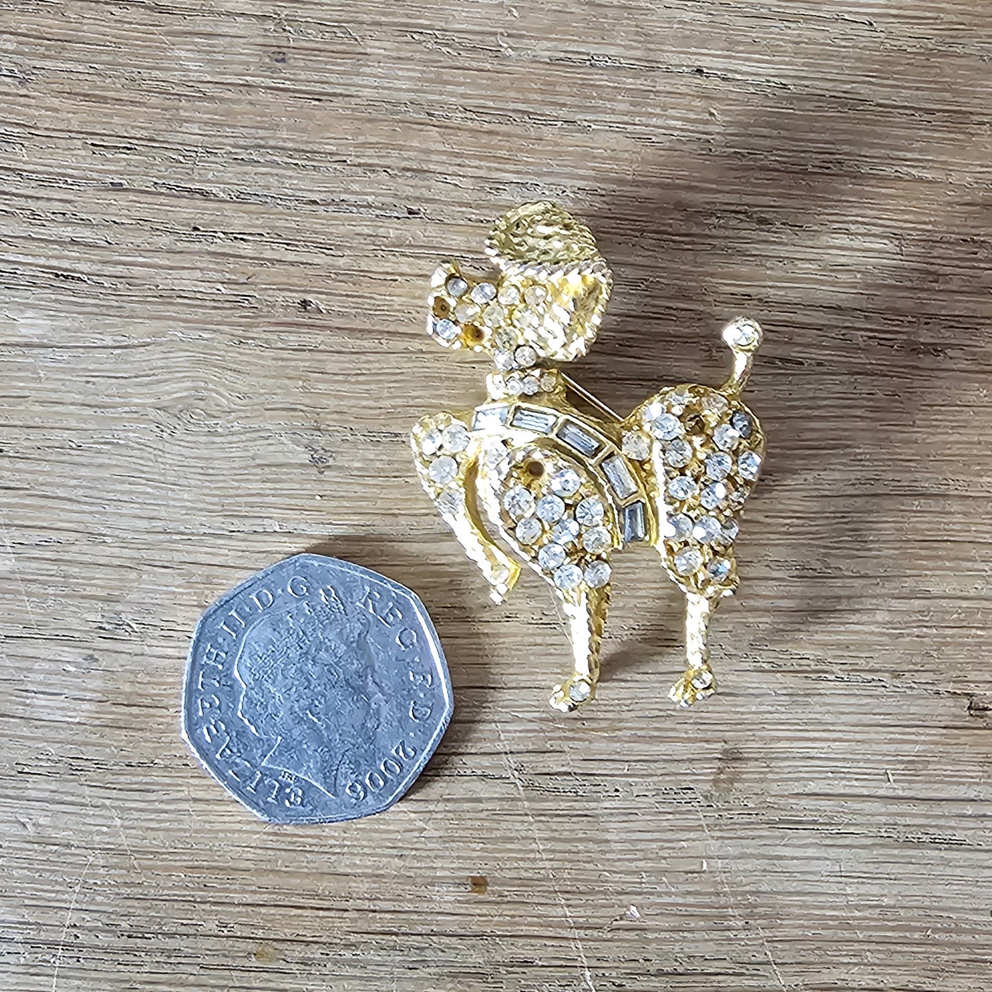 1960s gold-tone & rhinestone prancing French Poodle figural dog brooch