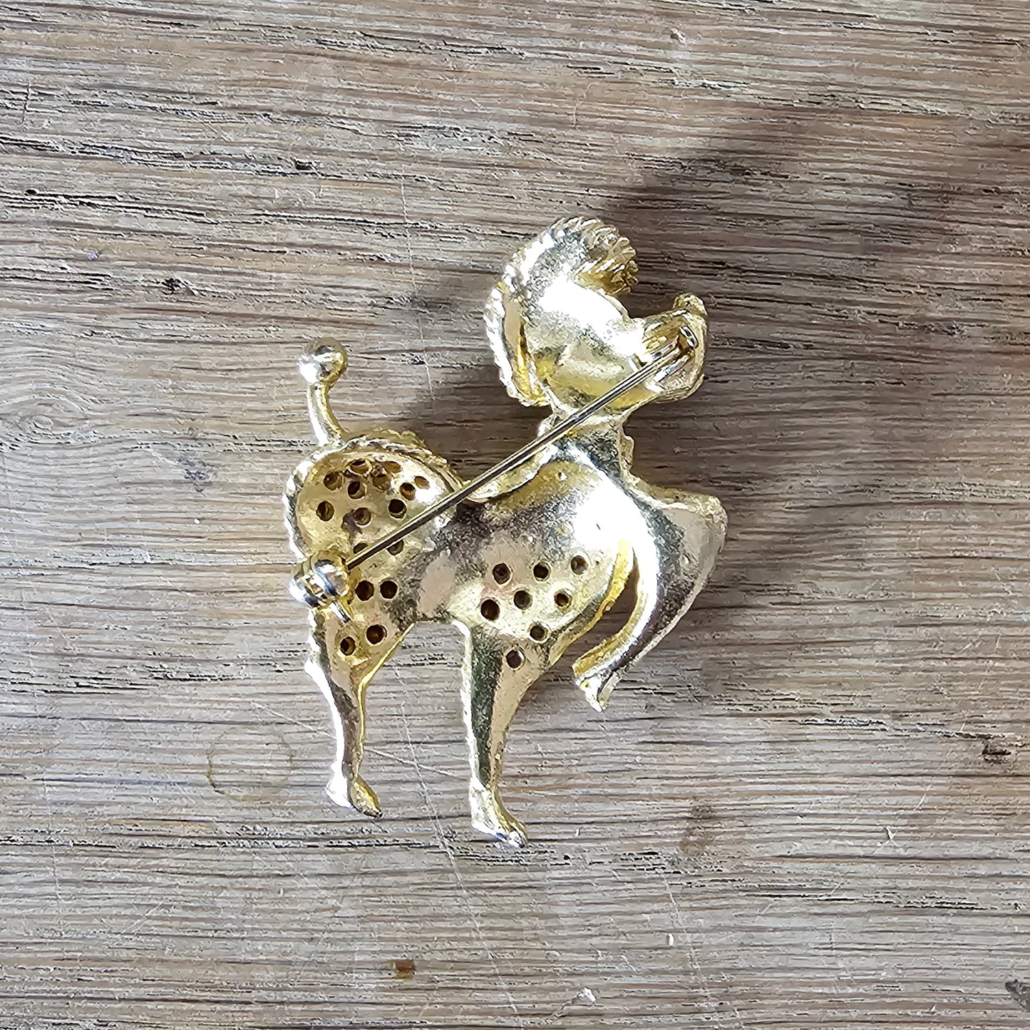 1960s gold-tone & rhinestone prancing French Poodle figural dog brooch